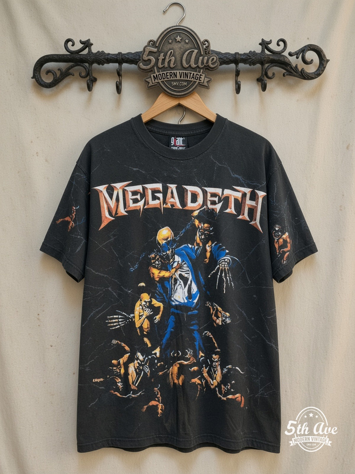 Megadeth – Holy Wars Vic Rattlehead All Over Print – Vintage Band T-Shirt — front on locked cream ornate 5th Ave rack