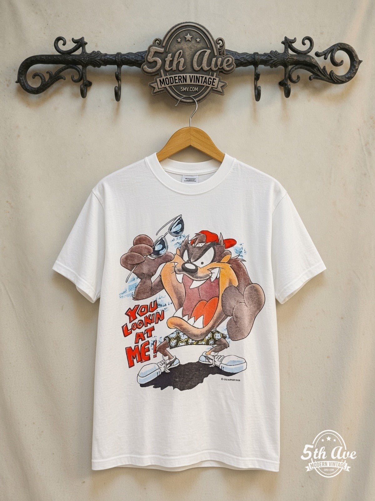 Looney Tunes – Taz-Mania Skateboard – New Vintage Graphic Tee — front on locked cream ornate 5th Ave rack