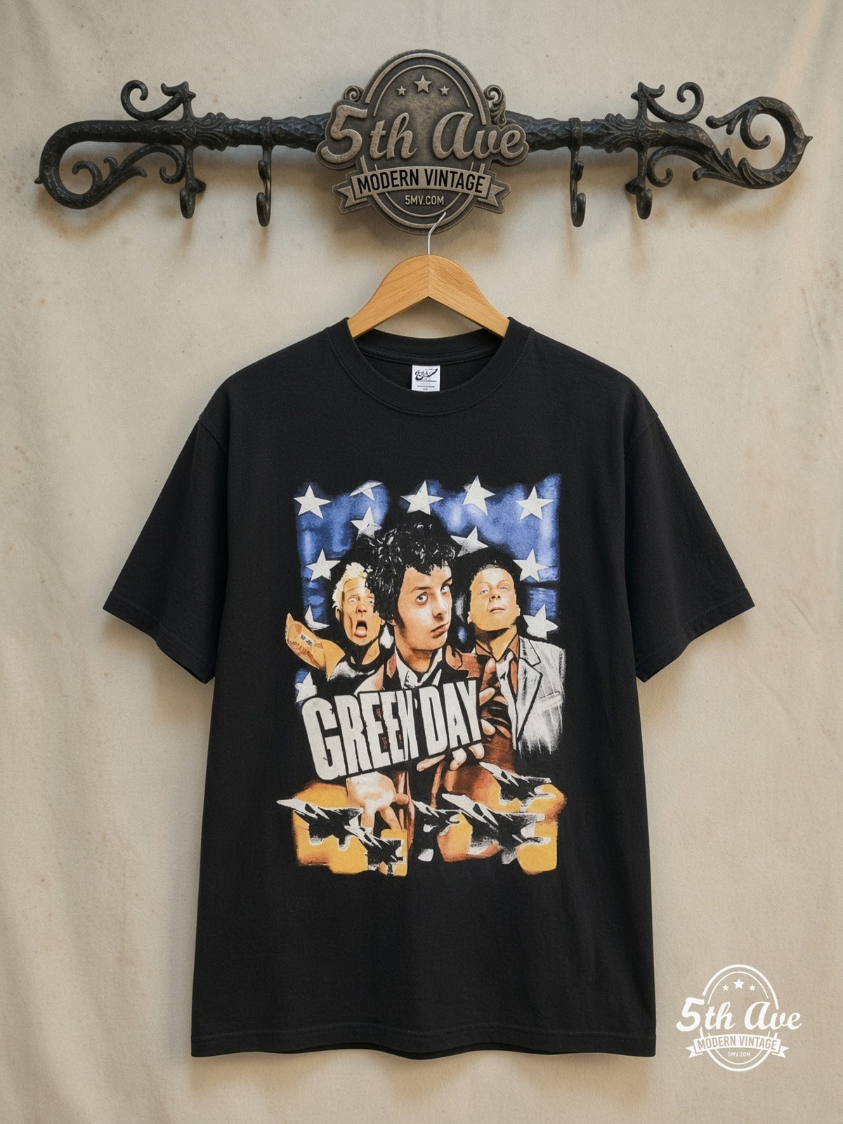 Green Day – Warning – Vintage Band T-Shirt — front on locked cream ornate 5th Ave rack