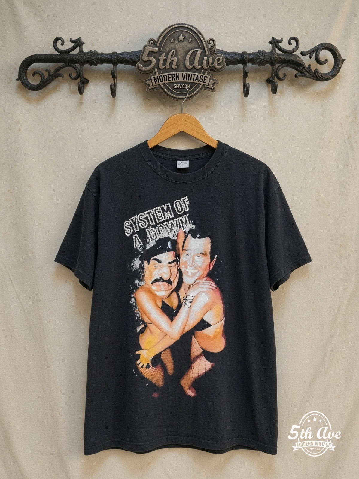 System of a Down – Bush and Saddam Party – Vintage Band T-Shirt — front on locked cream ornate 5th Ave rack
