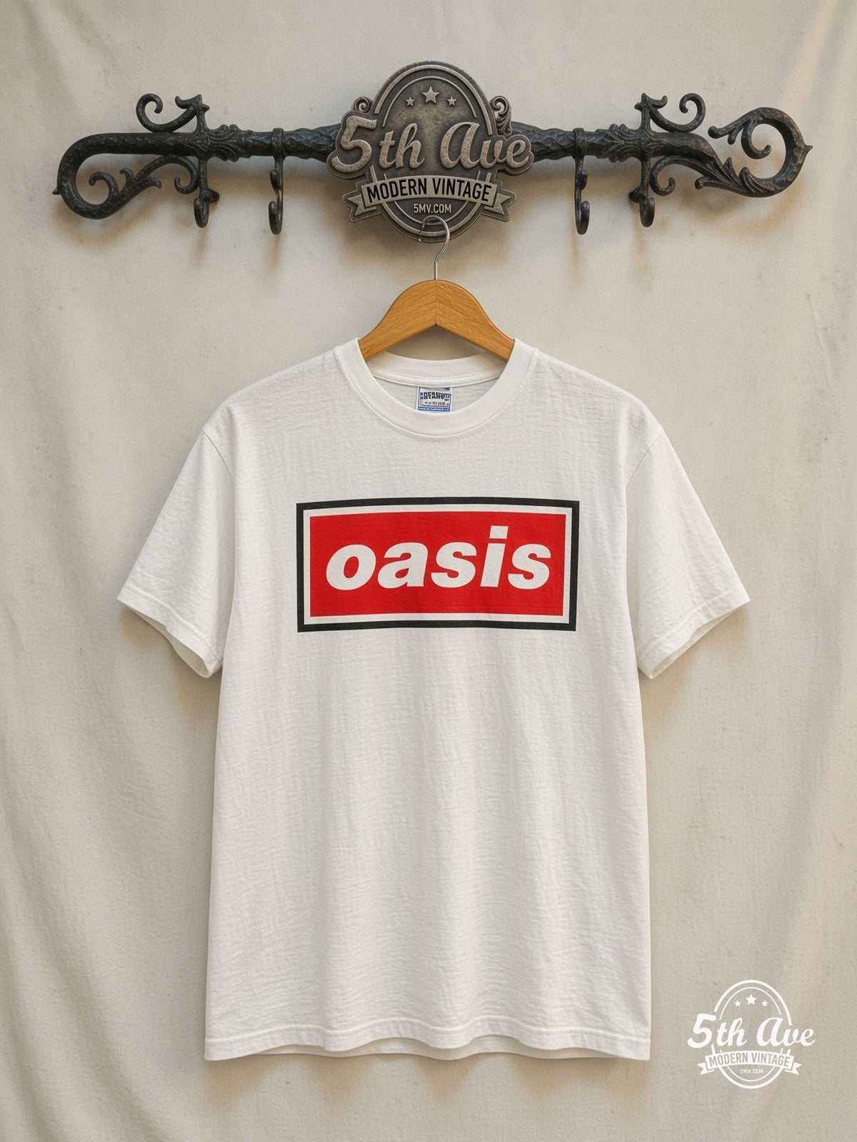 Oasis – Oasis Red Song List – Vintage Band T-Shirt — front on locked cream ornate 5th Ave rack