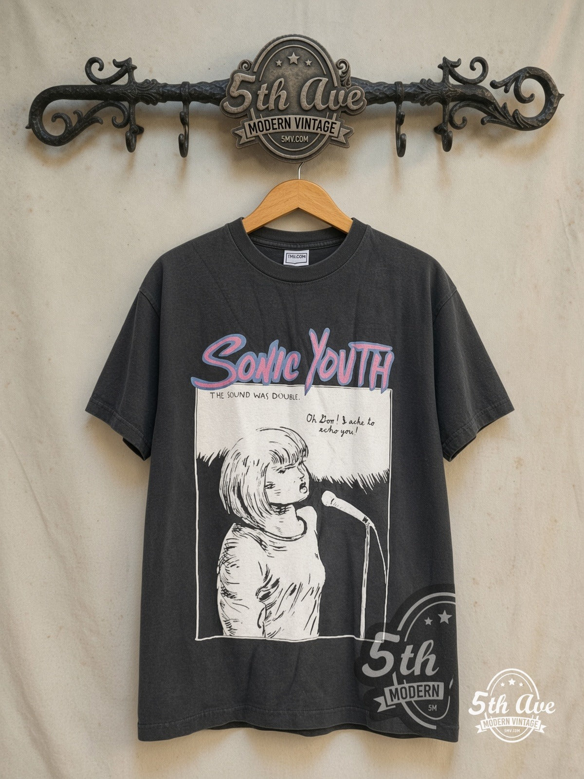 Sonic Youth – The Goo' I Left Behind – Vintage Band T-Shirt — front on locked cream ornate 5th Ave rack