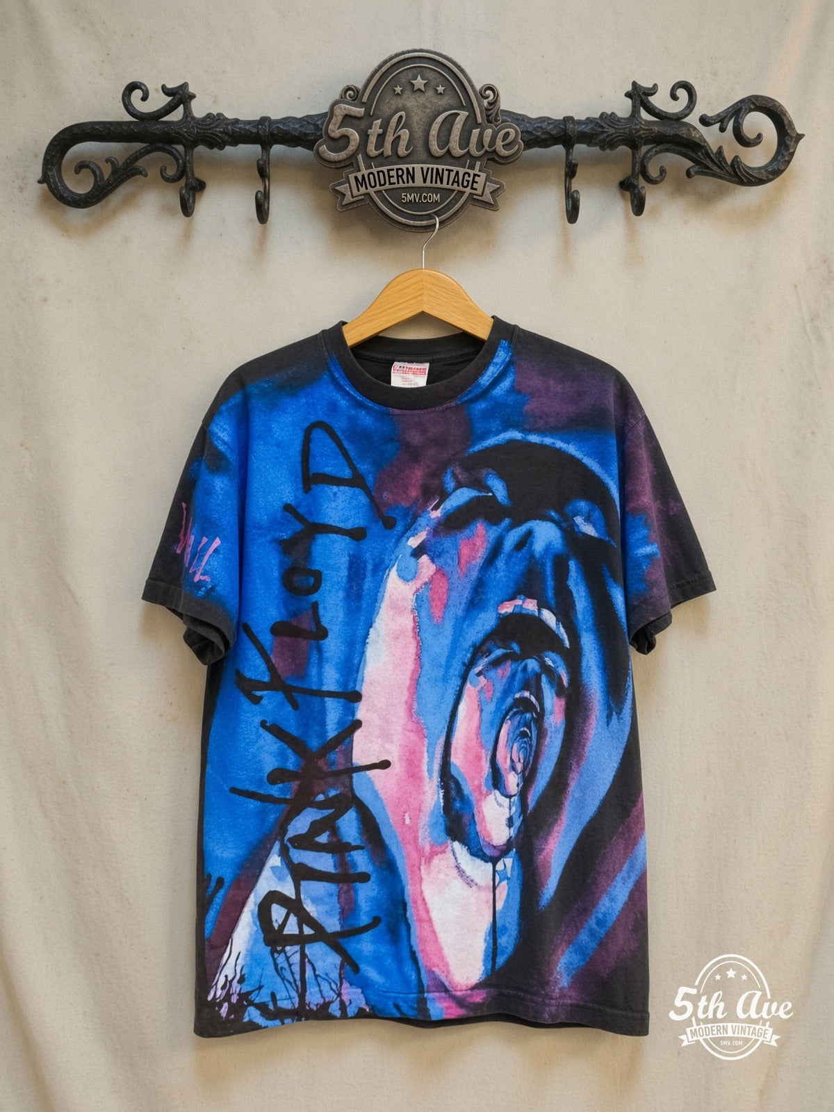 Pink Floyd – The Wall Pink Blue Screaming Face All Over Print – Vintage Band T-Shirt — front on locked cream ornate 5th Ave rack