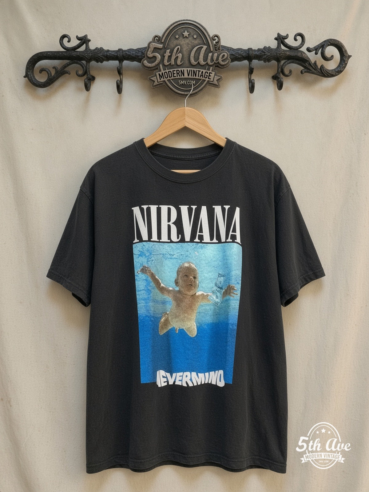 Nirvana – Nevermind Swimming Baby Album Cover – Vintage Band T-Shirt — front on locked cream ornate 5th Ave rack