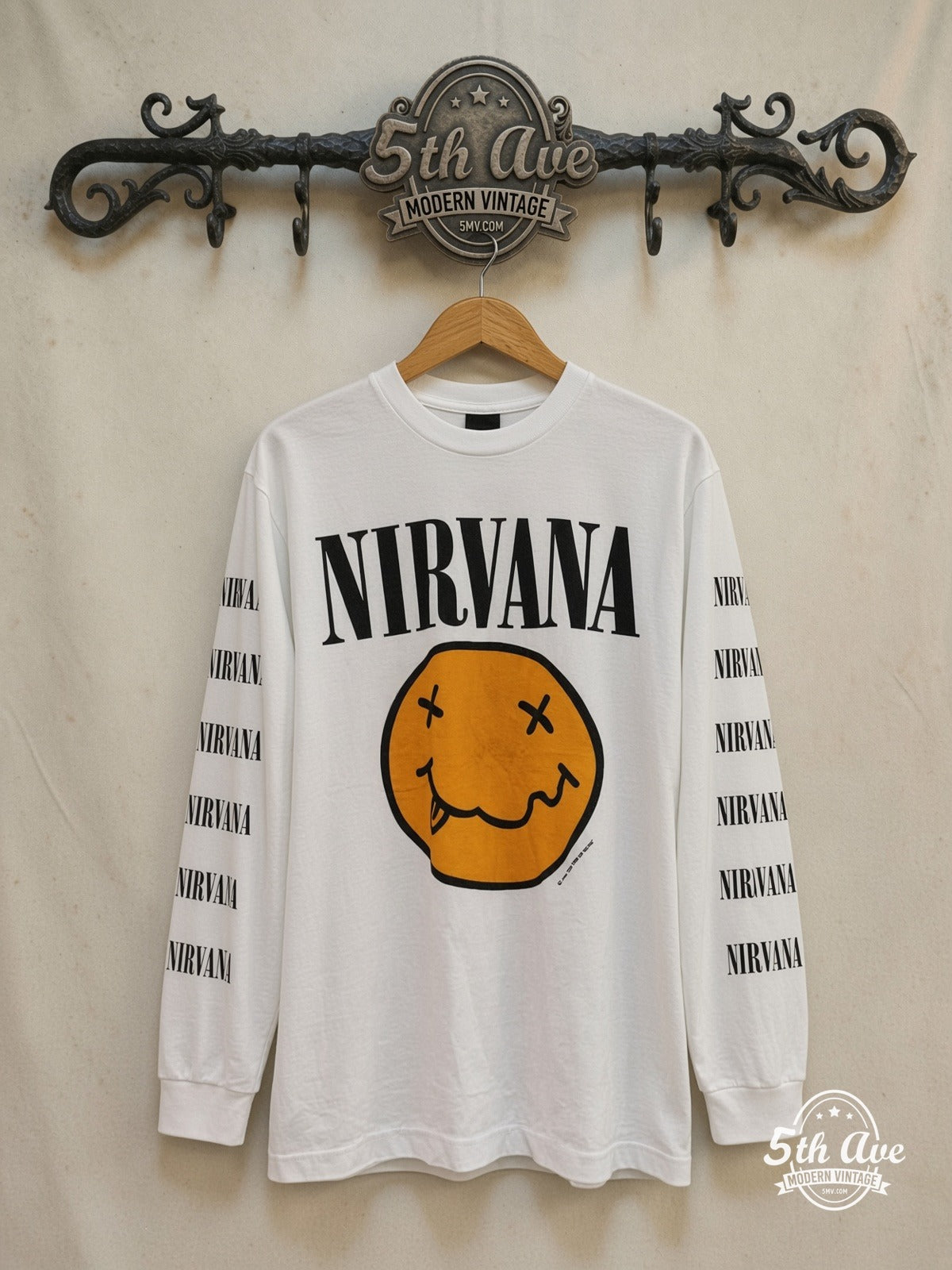 Nirvana and Butthole Surfers Chokebore Concert vintage band t-shirt, front view on a display rack