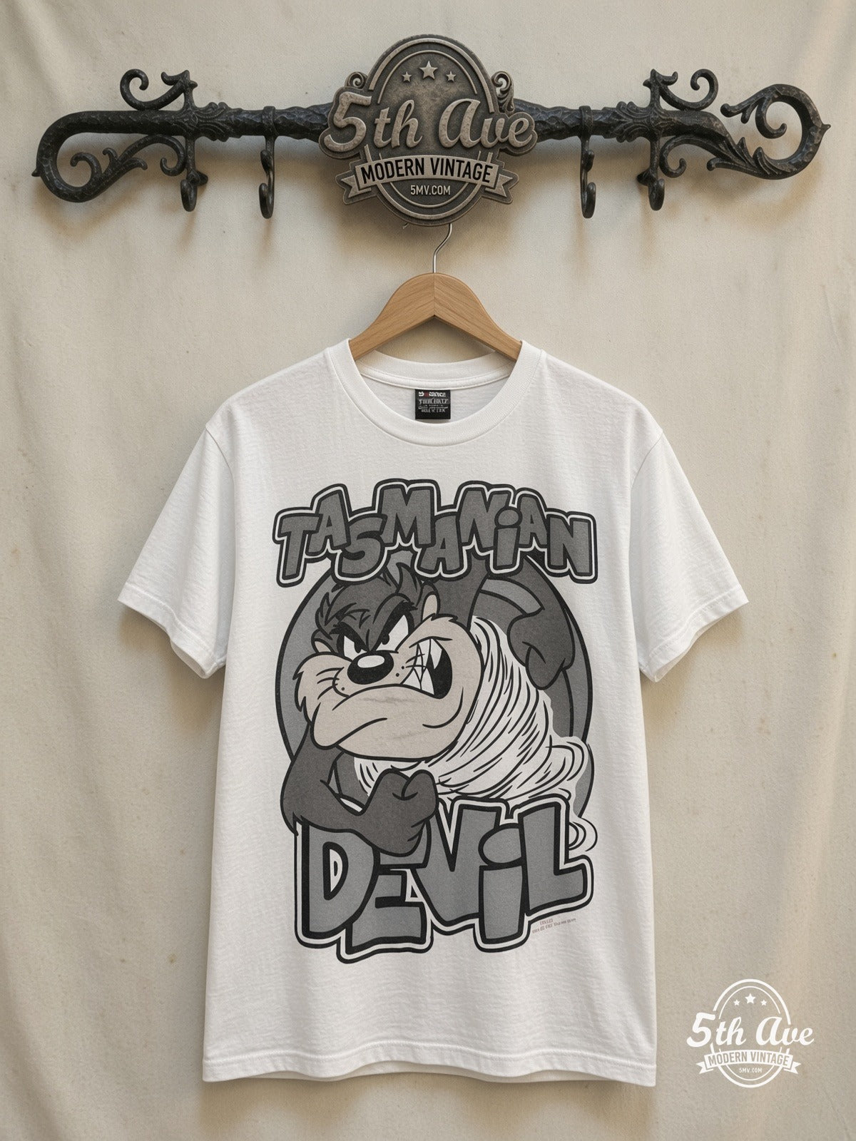 Taz – Taz's Gym No Pencilnecks White Tee – New Vintage Graphic Tee — front on locked cream ornate 5th Ave rack