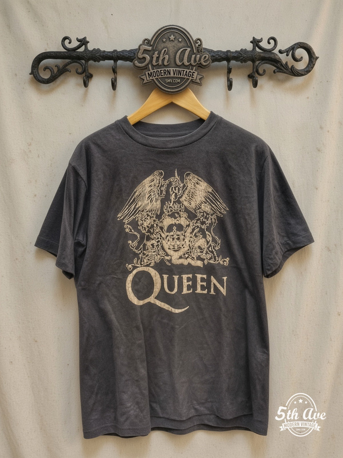Queen Regal Emblem vintage band t-shirt on rack
