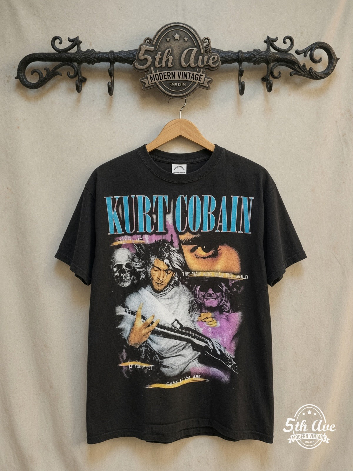Nirvana – Kurt Cobain Come As You Are Collage Skull – Vintage Band T-Shirt — front on locked cream ornate 5th Ave rack