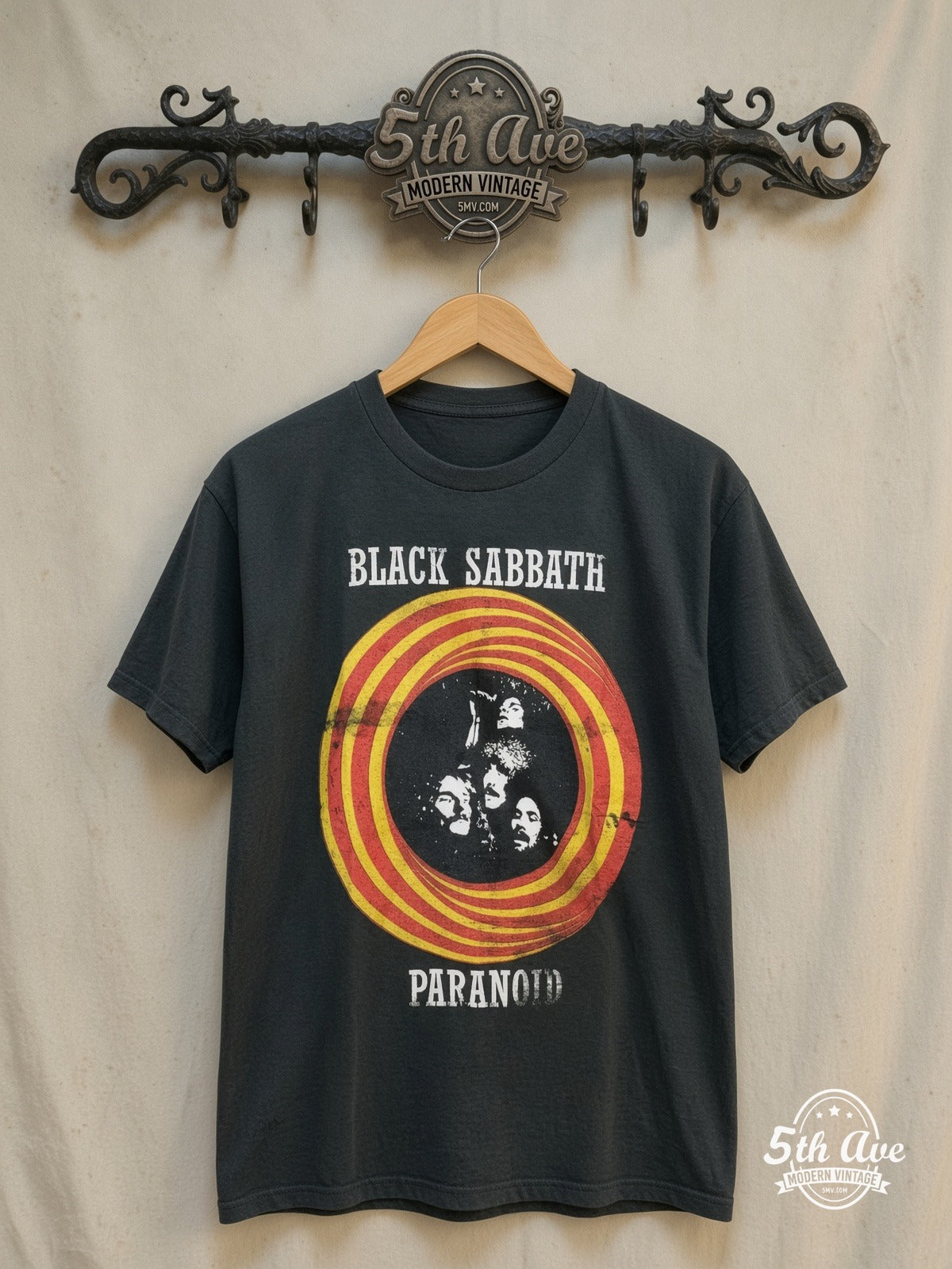 Black Sabbath – Paranoid – Vintage Band T-Shirt — front on locked cream ornate 5th Ave rack