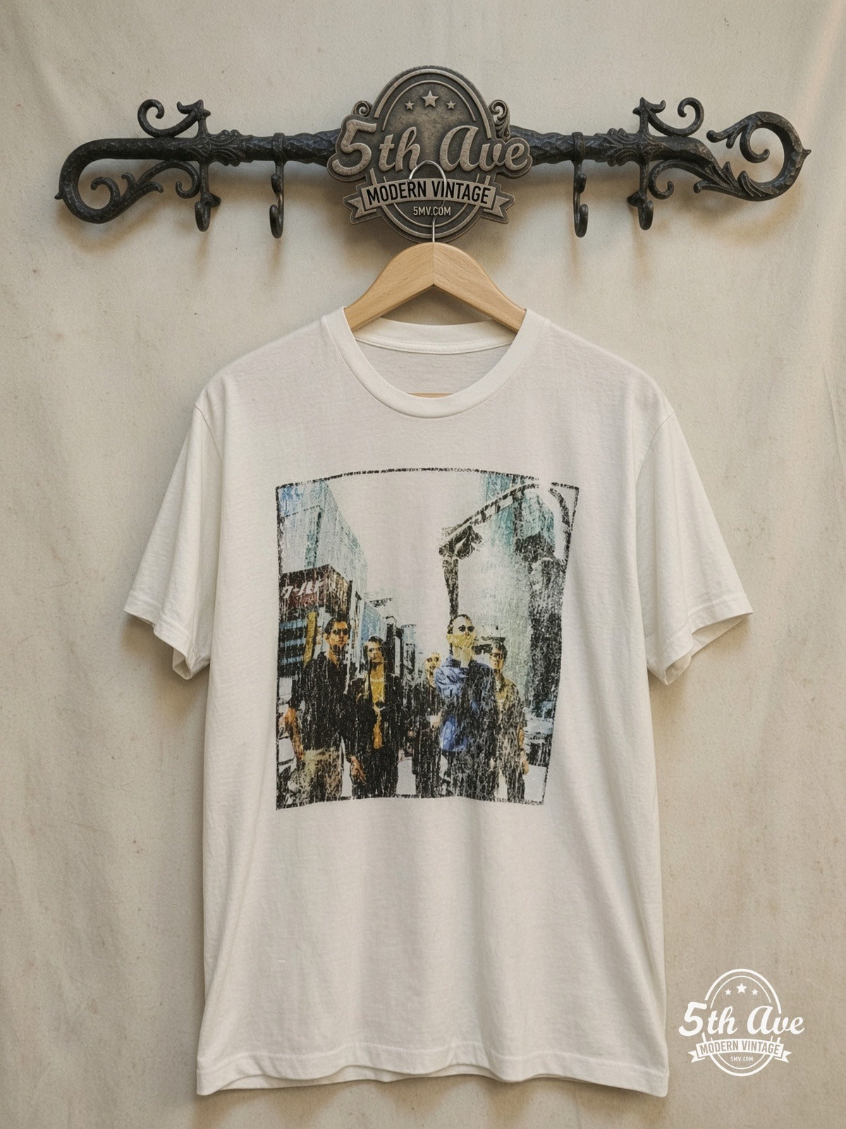 Radiohead – Tokyo Street Walking Photo White – Vintage Band T-Shirt — front on locked cream ornate 5th Ave rack