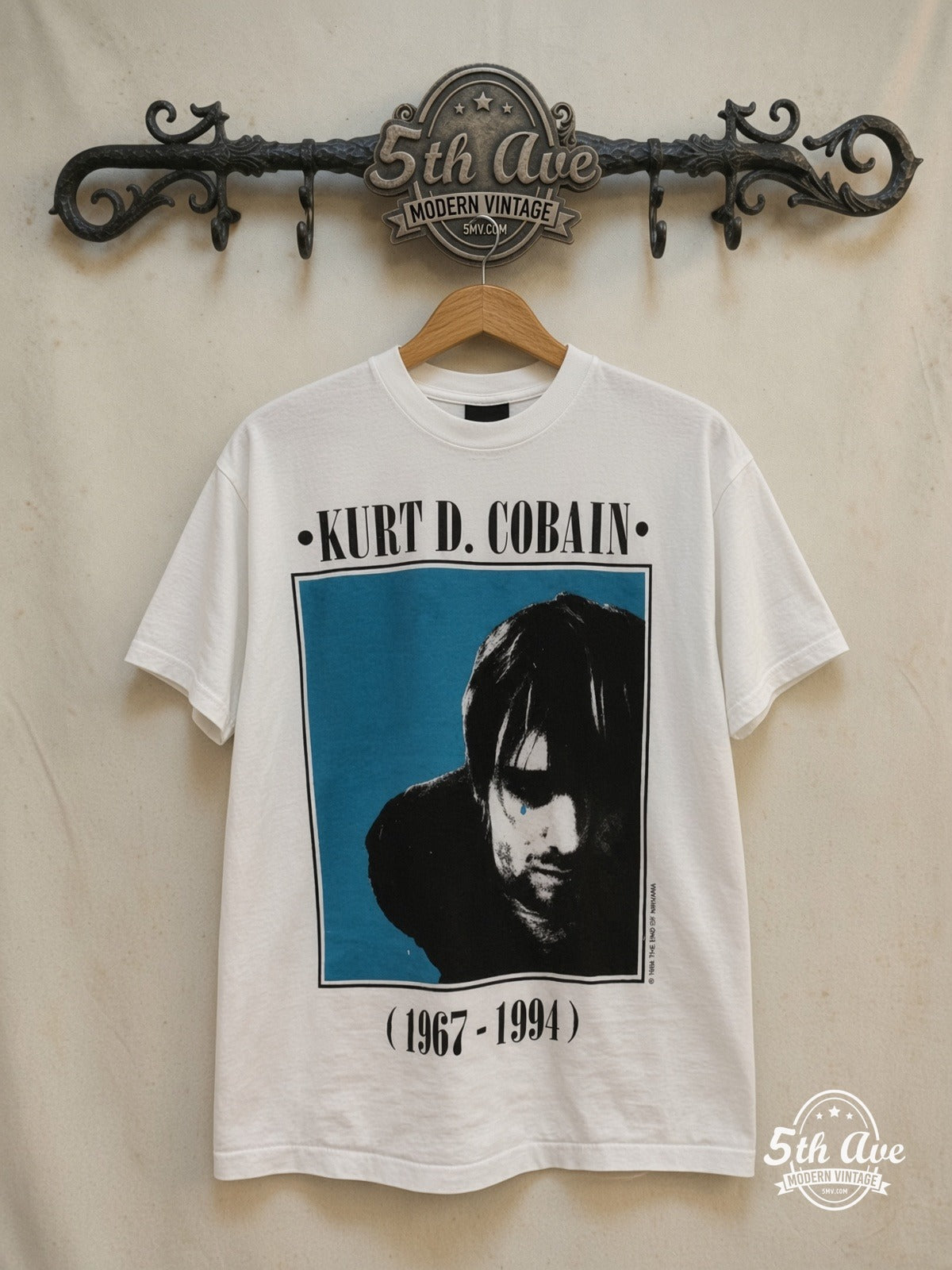 Kurt Cobain – Grunge Tribute – Vintage Band T-Shirt — front on locked cream ornate 5th Ave rack