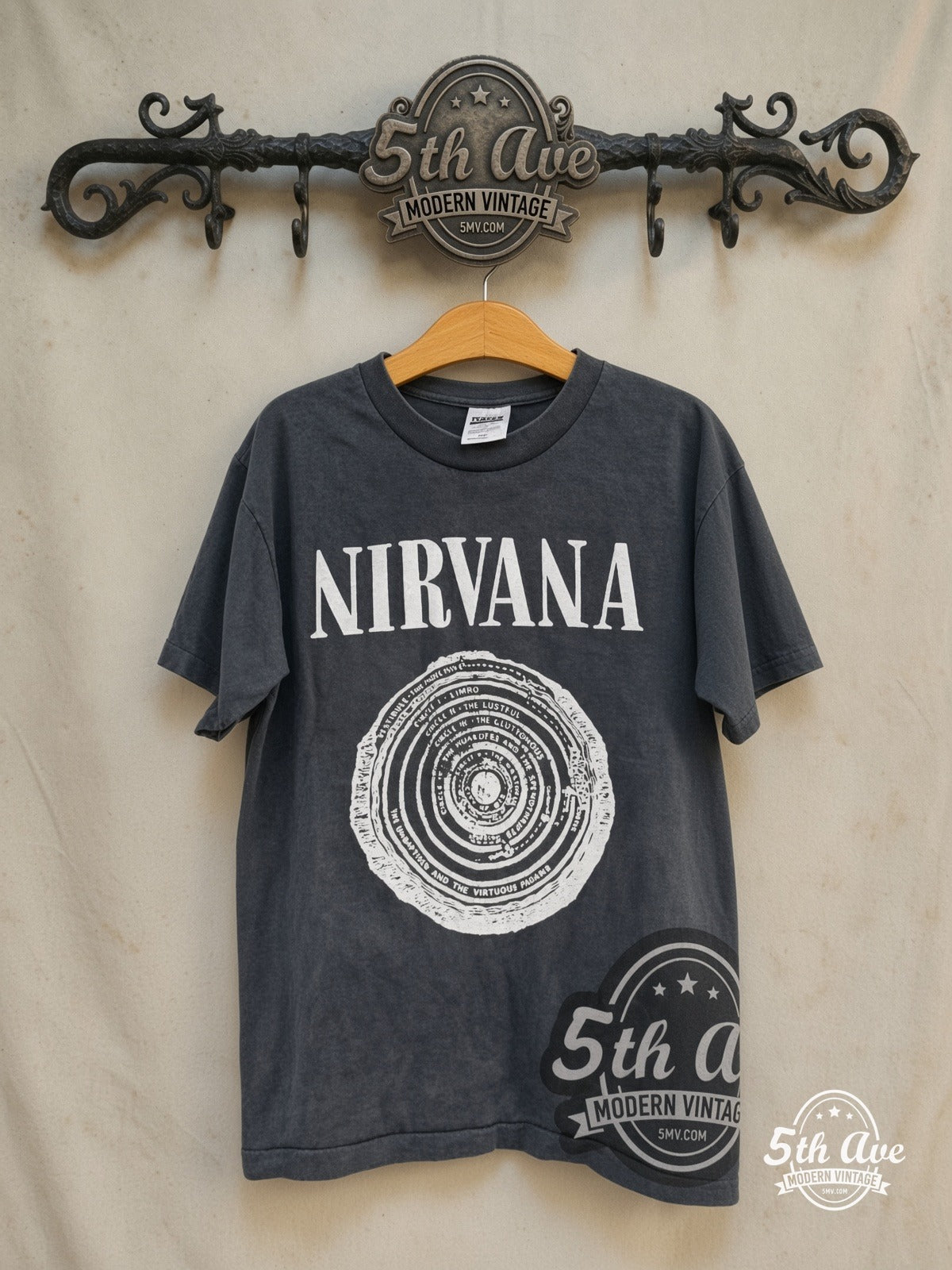 Nirvana – Circles of Hell Sub Pop Back Print – Vintage Band T-Shirt — front on locked cream ornate 5th Ave rack