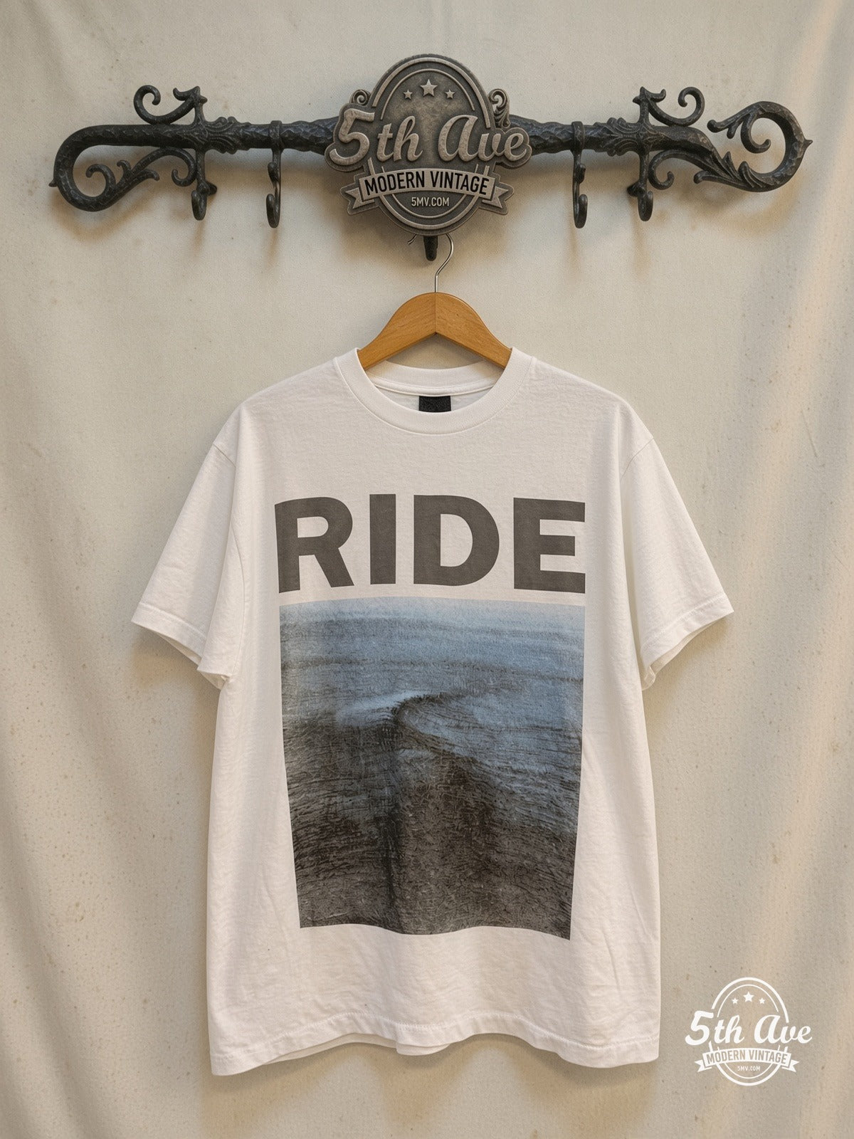 Ride – Nowhere Wave Cover White – Vintage Band T-Shirt — front on locked cream ornate 5th Ave rack