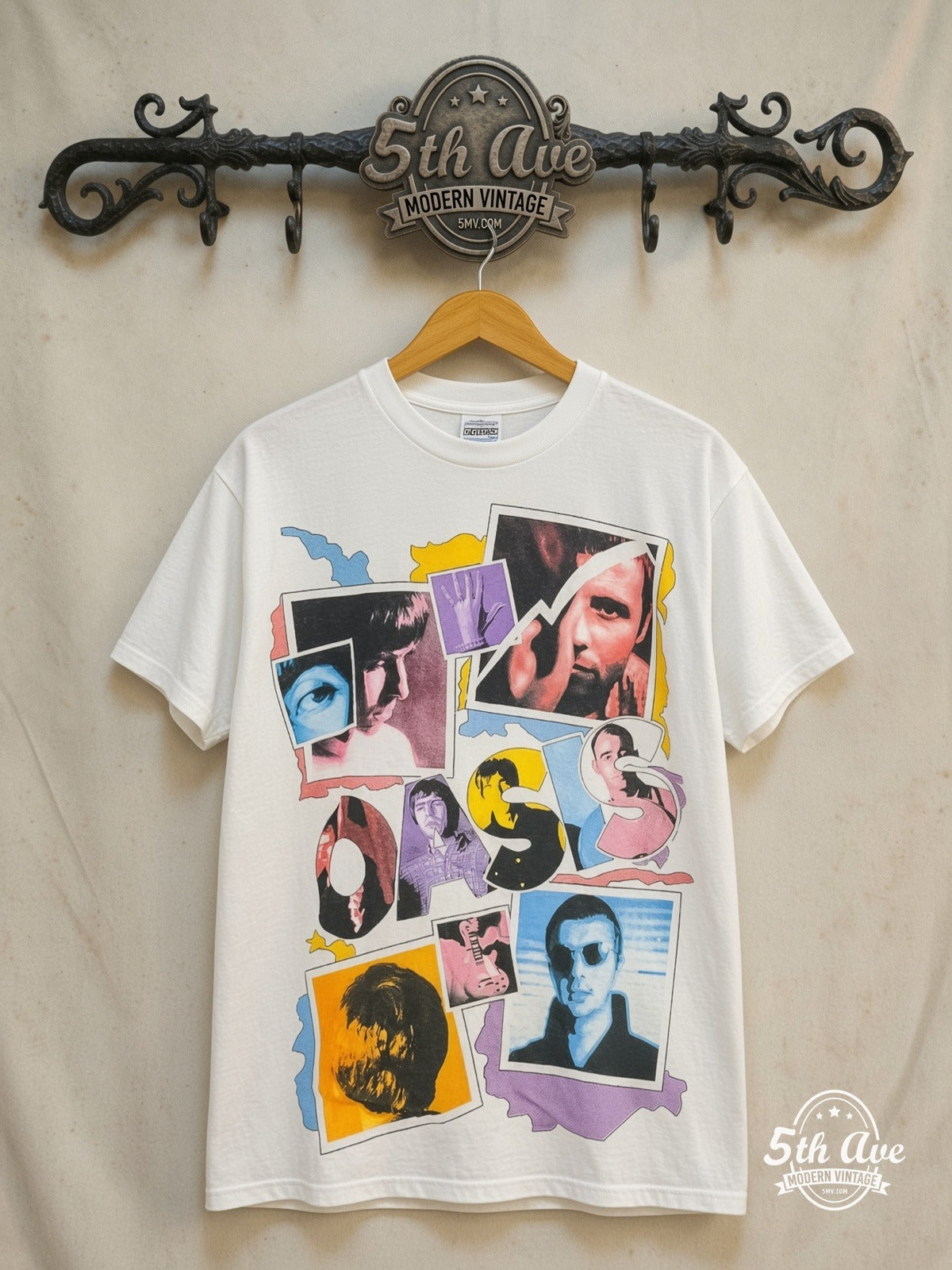 Oasis Polaroid photograph vintage band t-shirt in white, front view on a display rack