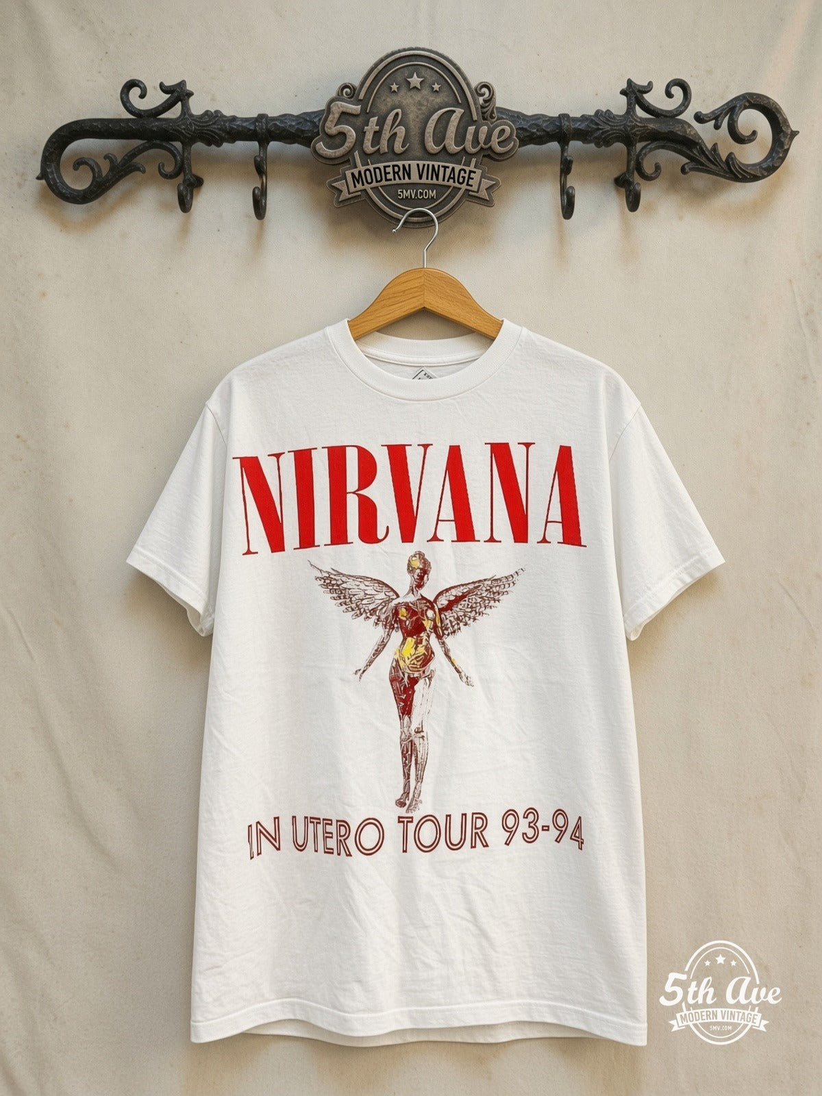 Nirvana – In Utero Tour 93-94 – Vintage Band T-Shirt — front on locked cream ornate 5th Ave rack