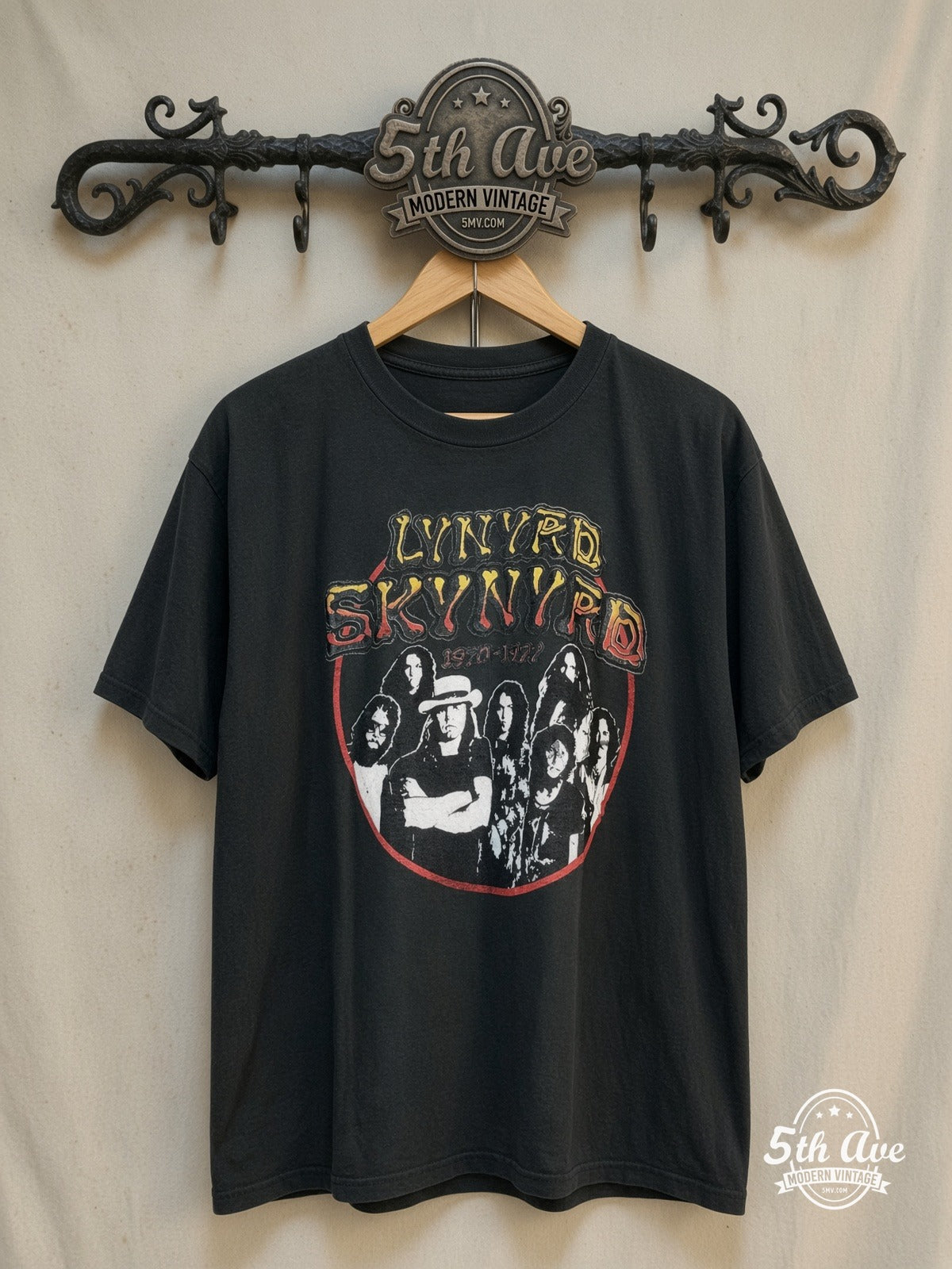Lynyrd Skynyrd – 1970–1977 Band Image – Vintage Band T-Shirt — front on locked cream ornate 5th Ave rack