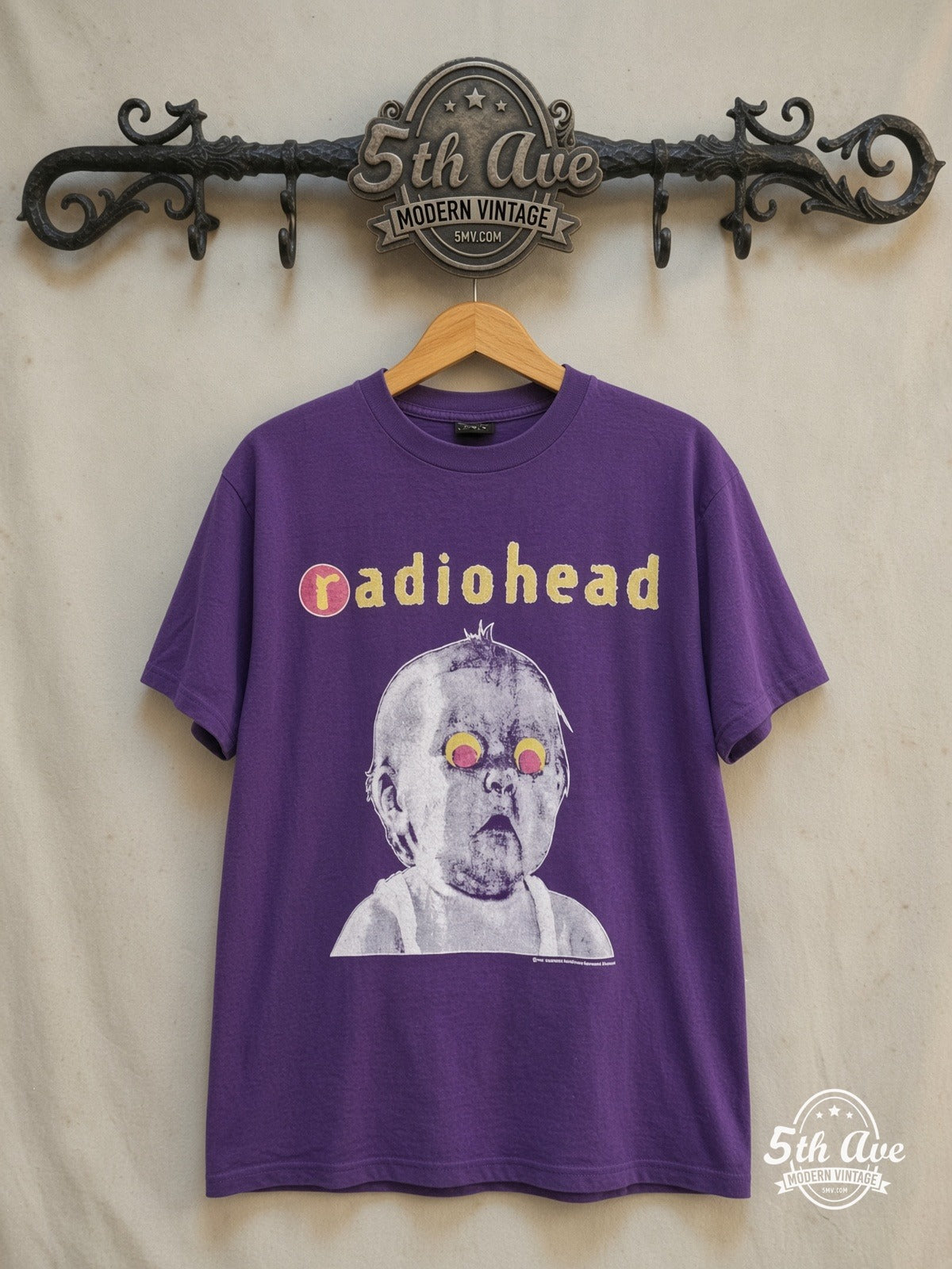 Radiohead – Pablo Honey Tour Baby Purple – Vintage Band T-Shirt — front on locked cream ornate 5th Ave rack