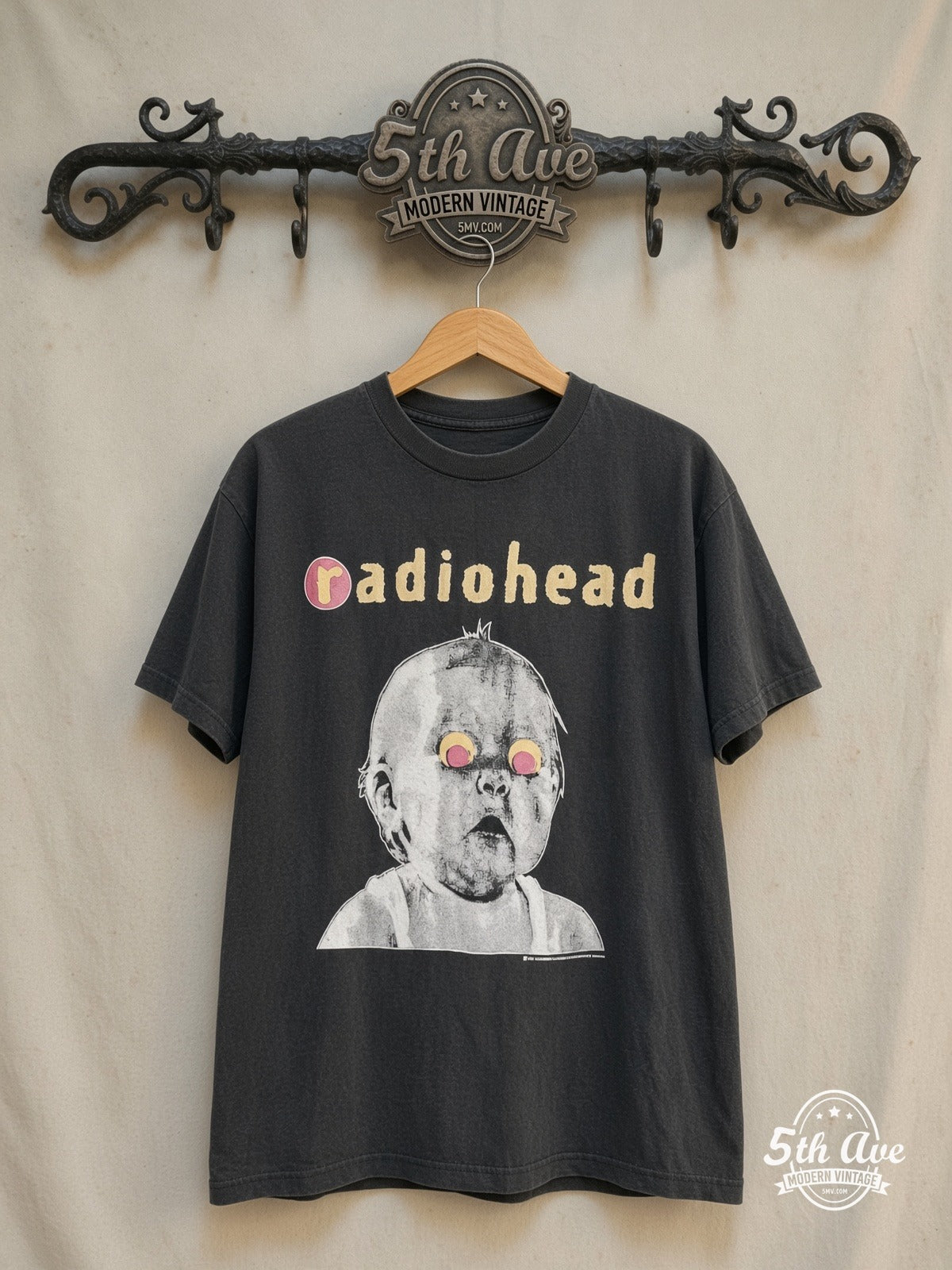 Radiohead – Pablo Honey Tour Baby Black – Vintage Band T-Shirt — front on locked cream ornate 5th Ave rack