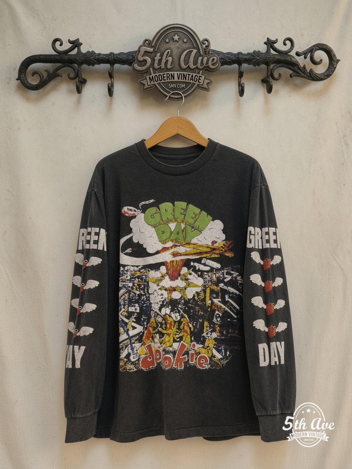 Green Day – Dookie World Tour 1994 – Vintage Band T-Shirt — front on locked cream ornate 5th Ave rack
