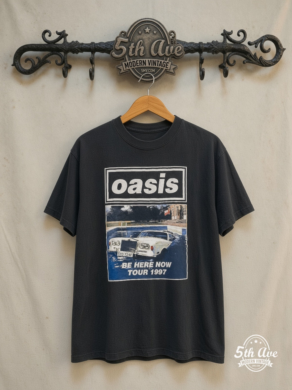 Oasis – Be Here Now' Tour 1997 – Vintage Band T-Shirt — front on locked cream ornate 5th Ave rack