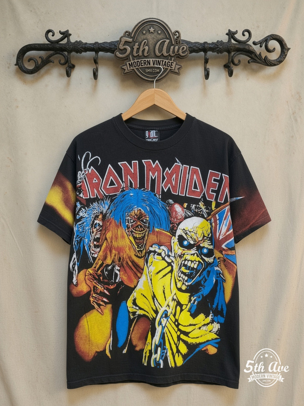 Iron Maiden – Iron Maiden Artwork – All Over Print – Vintage Band T-Shirt — front on locked cream ornate 5th Ave rack
