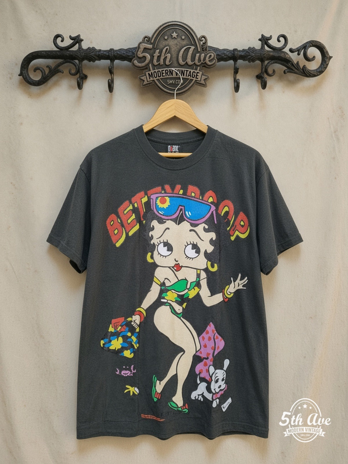 Betty Boop Beach Vibes T-Shirt – Vintage Glamour — front on locked cream ornate 5th Ave rack