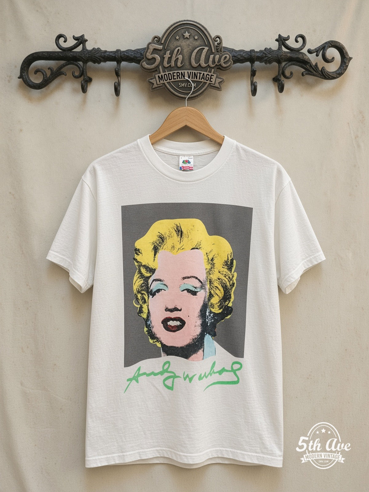 Marilyn Monroe – Andy Warhol Signature Art – Vintage Graphic Tee — front on locked cream ornate 5th Ave rack