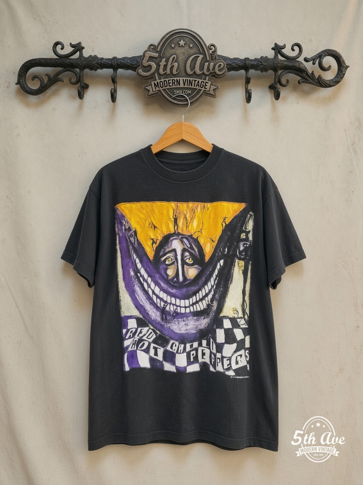 Red Hot Chili Peppers – Warlocks Big Smile Checkered – Vintage Band T-Shirt — front on locked cream ornate 5th Ave rack