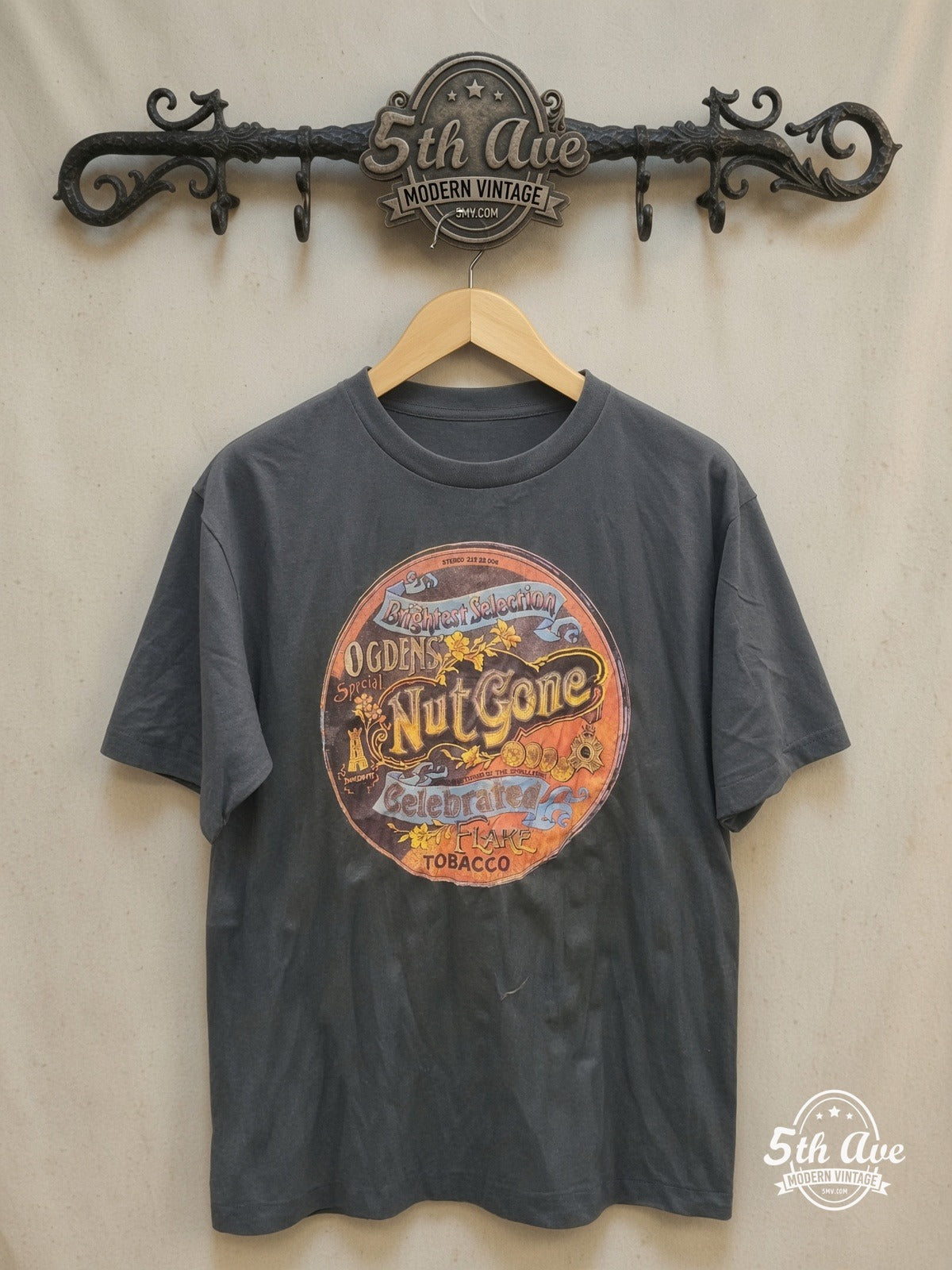 Woodstock – Nut Gone – Vintage Band T-Shirt — front on locked cream ornate 5th Ave rack
