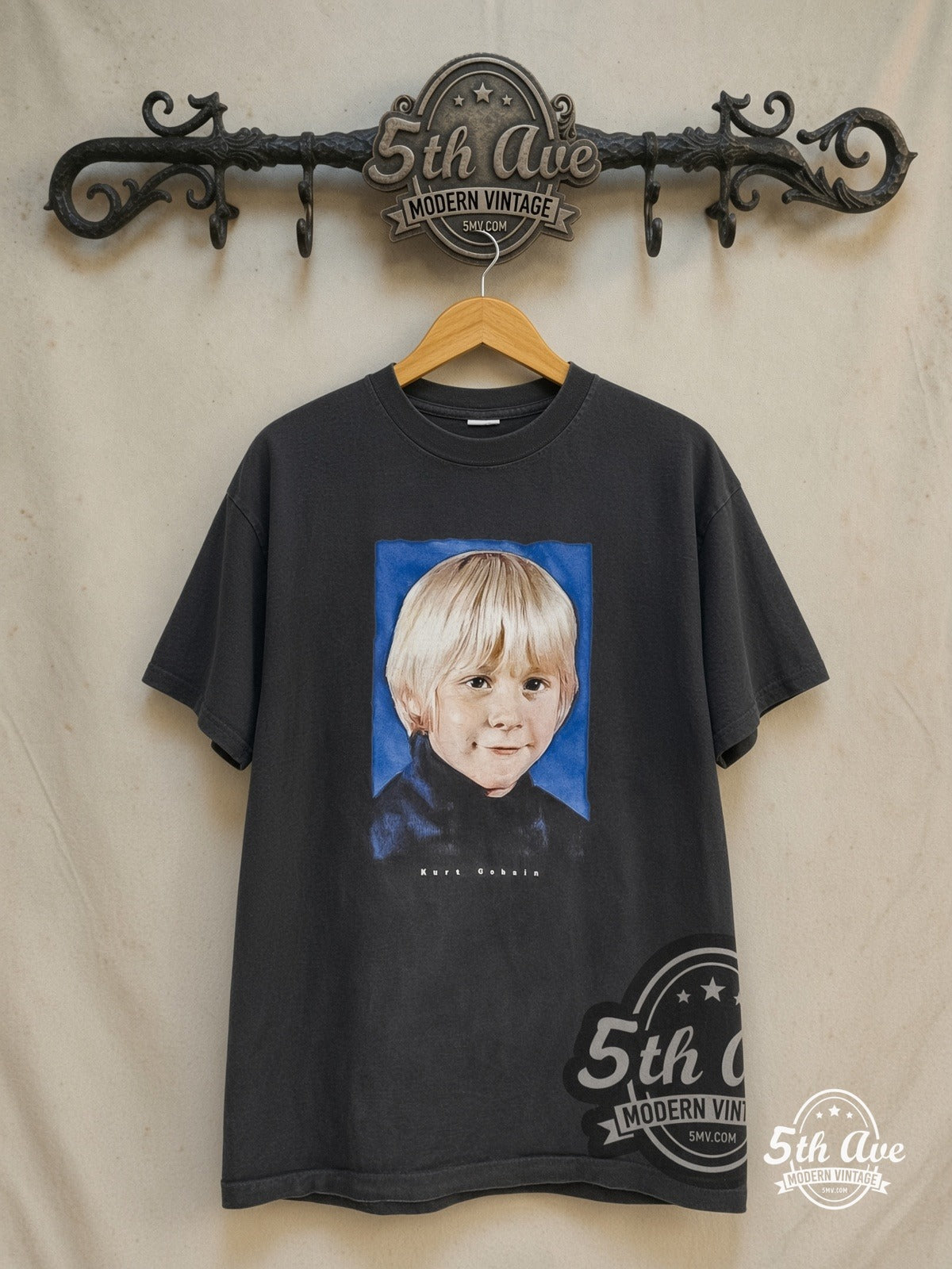Nirvana – Kid Blue – Vintage Band T-Shirt — front on locked cream ornate 5th Ave rack