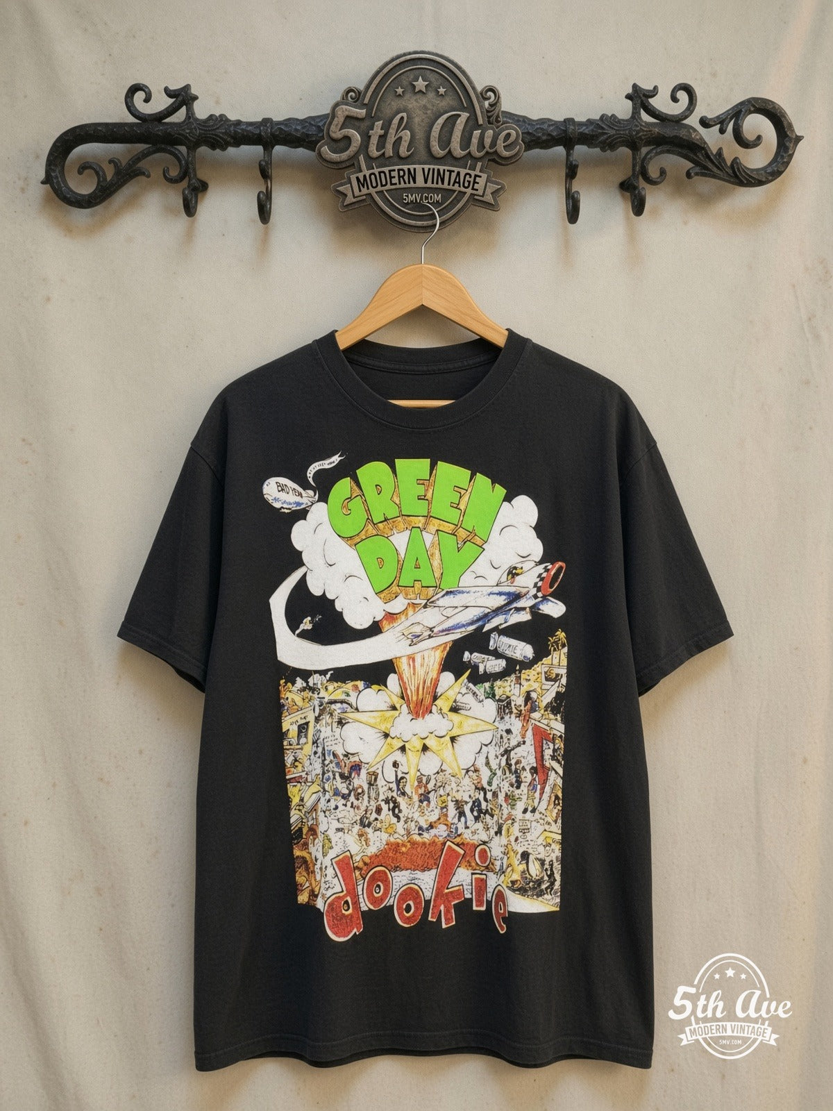 Green Day – Dookie Album Cover Bomber – Vintage Band T-Shirt — front on locked cream ornate 5th Ave rack