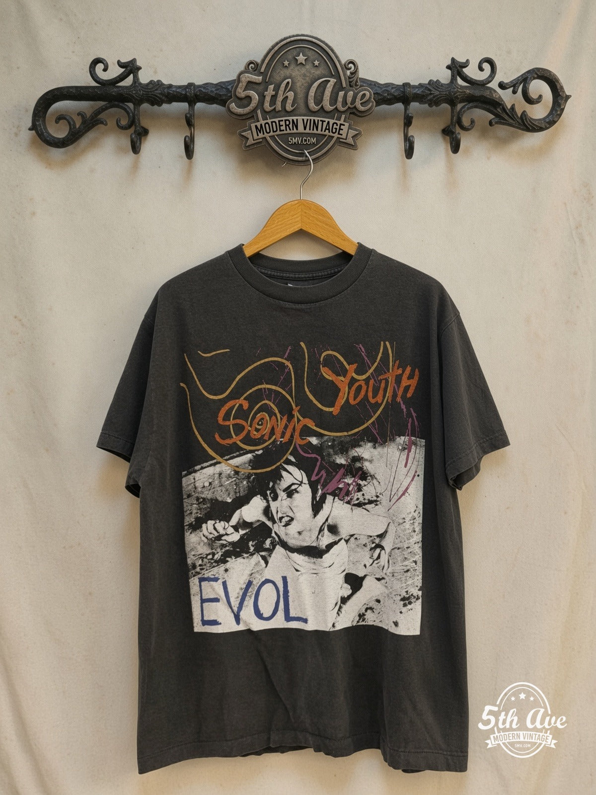 Sonic Youth – Evol Tour 1986 – Vintage Band T-Shirt — front on locked cream ornate 5th Ave rack