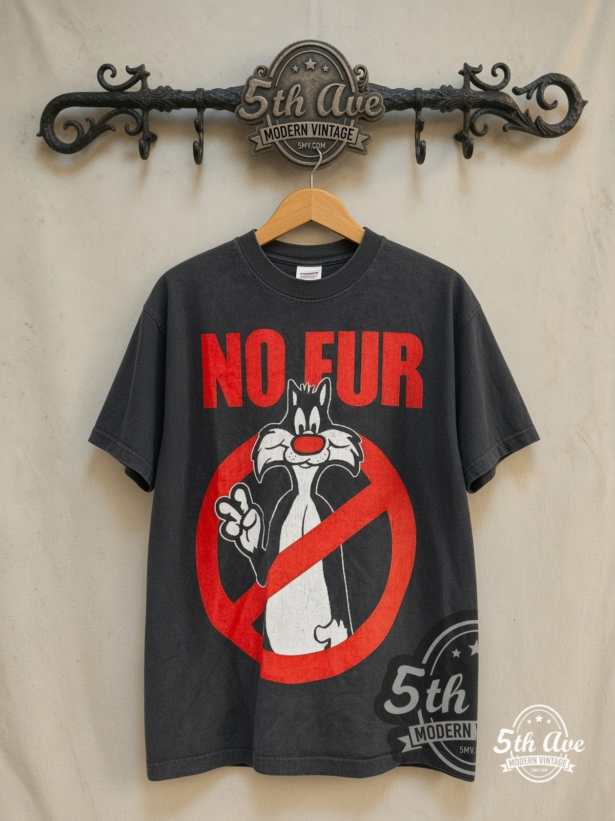 Looney Tunes Sylvester No Fur graphic tee in black, front view on a display rack