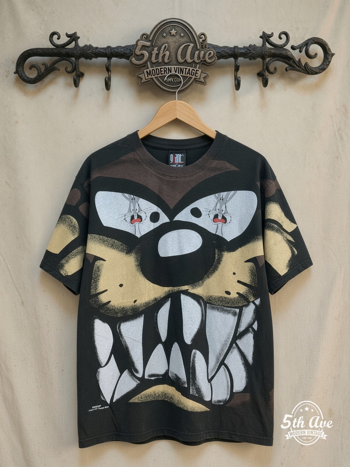 Bugs Bunny – Taz-Mania and Bugs Bunny – All Over Print – New Vintage Graphic Tee — front on locked cream ornate 5th Ave rack