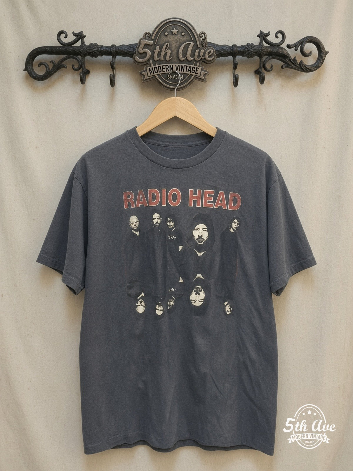 Radiohead – RADIO HEAD Mirrored Upside Down Head – Vintage Band T-Shirt — front on locked cream ornate 5th Ave rack