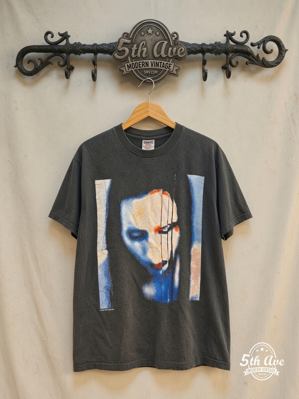 Marilyn Manson – The Long Hard Road Out of Hell – Vintage Band T-Shirt — front on locked cream ornate 5th Ave rack