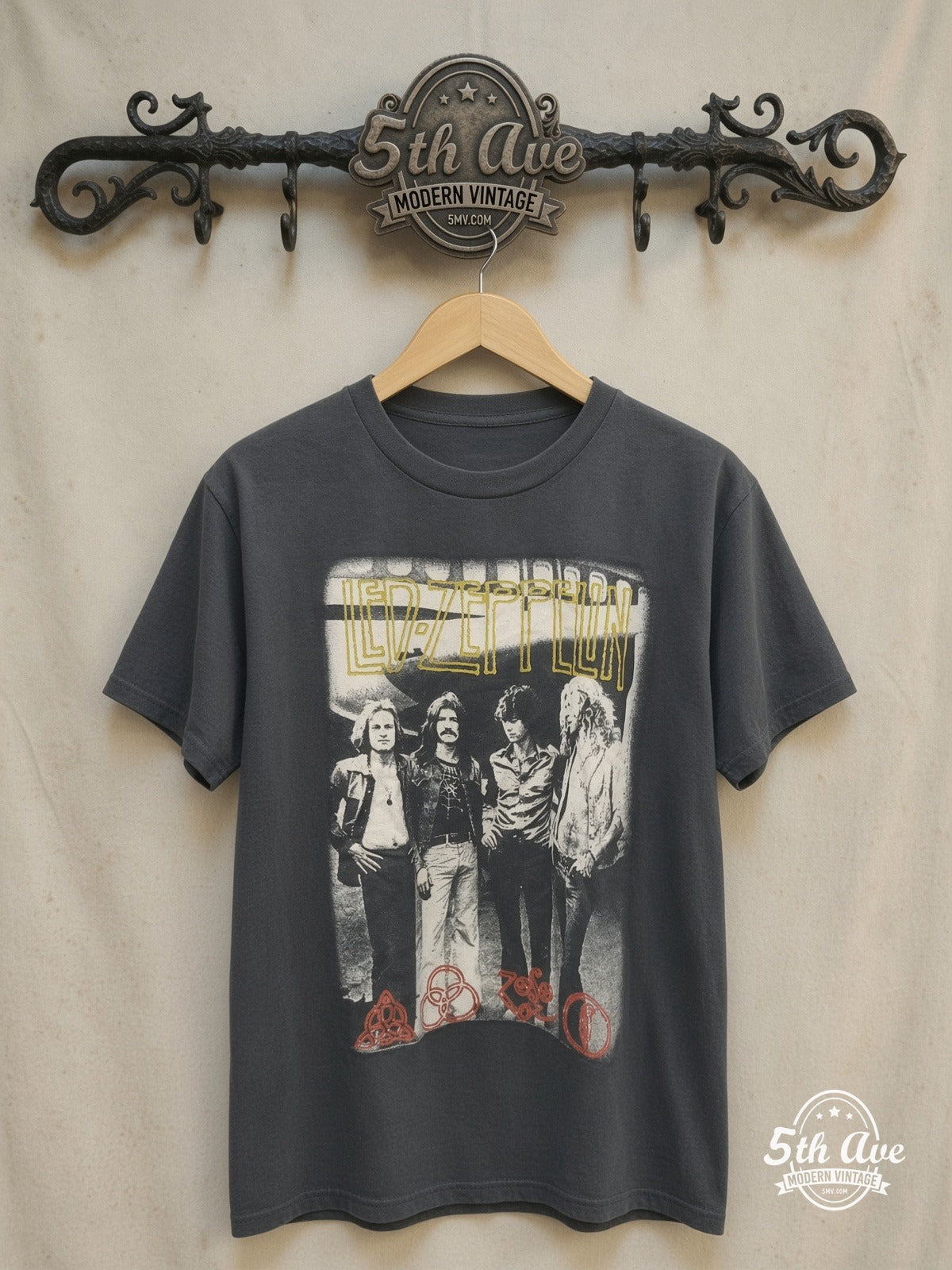 Led Zeppelin – Tribute with Zoso Logos – Vintage Band T-Shirt — front on locked cream ornate 5th Ave rack