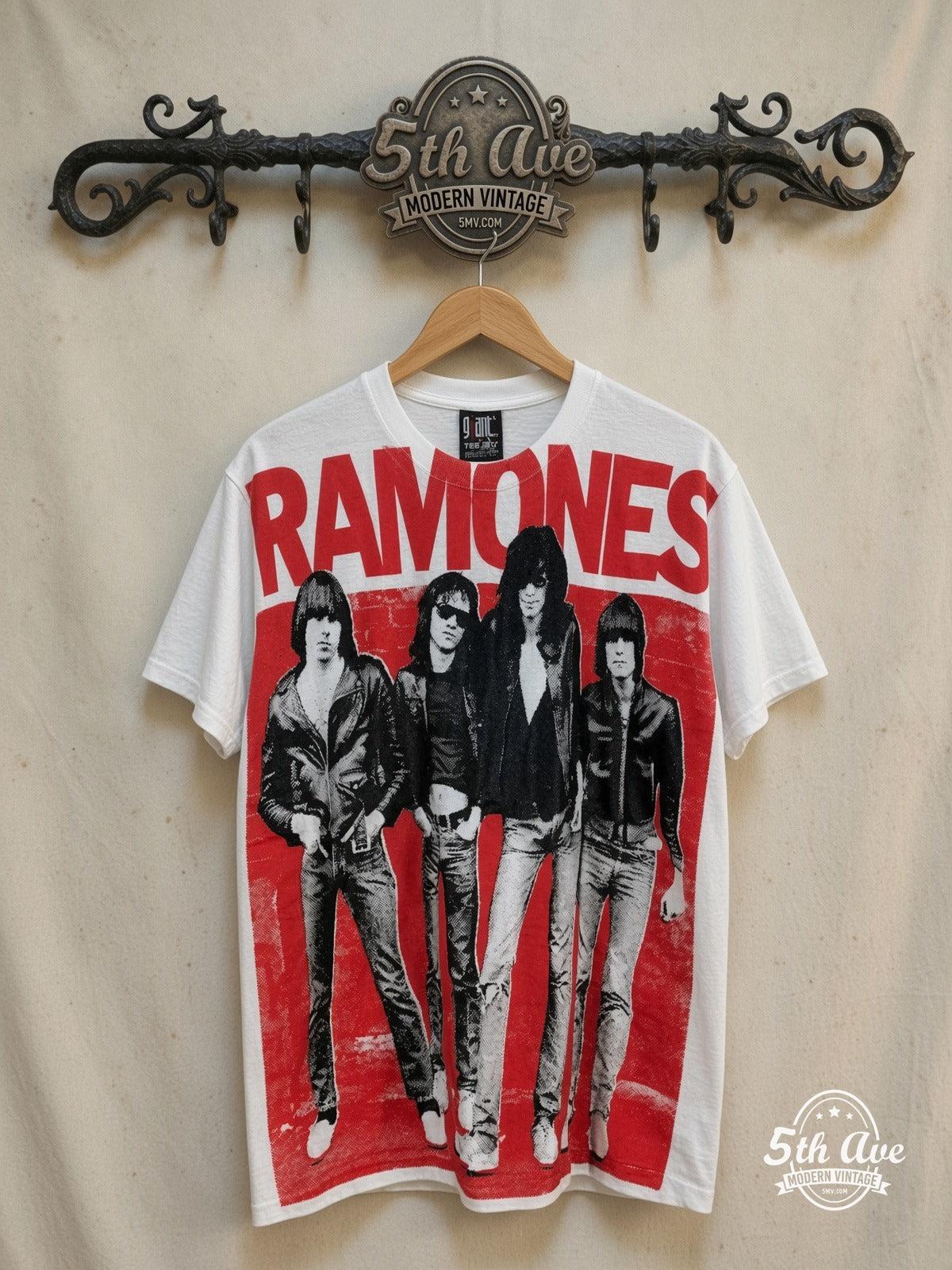 The Ramones – The Ramones – All Over Print – Vintage Band T-Shirt — front on locked cream ornate 5th Ave rack