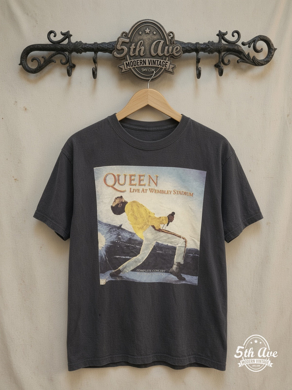 Queen – Live at Wembley Stadium – Vintage Band T-Shirt — front on locked cream ornate 5th Ave rack