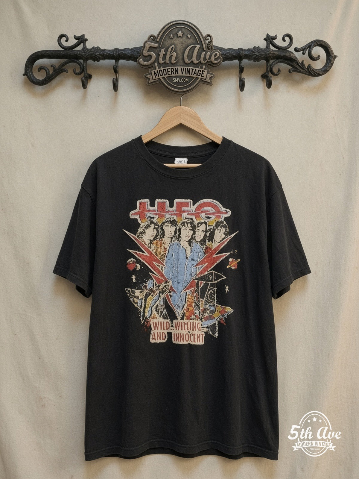 UFO – UFO Graphic – Vintage Band T-Shirt — front on locked cream ornate 5th Ave rack