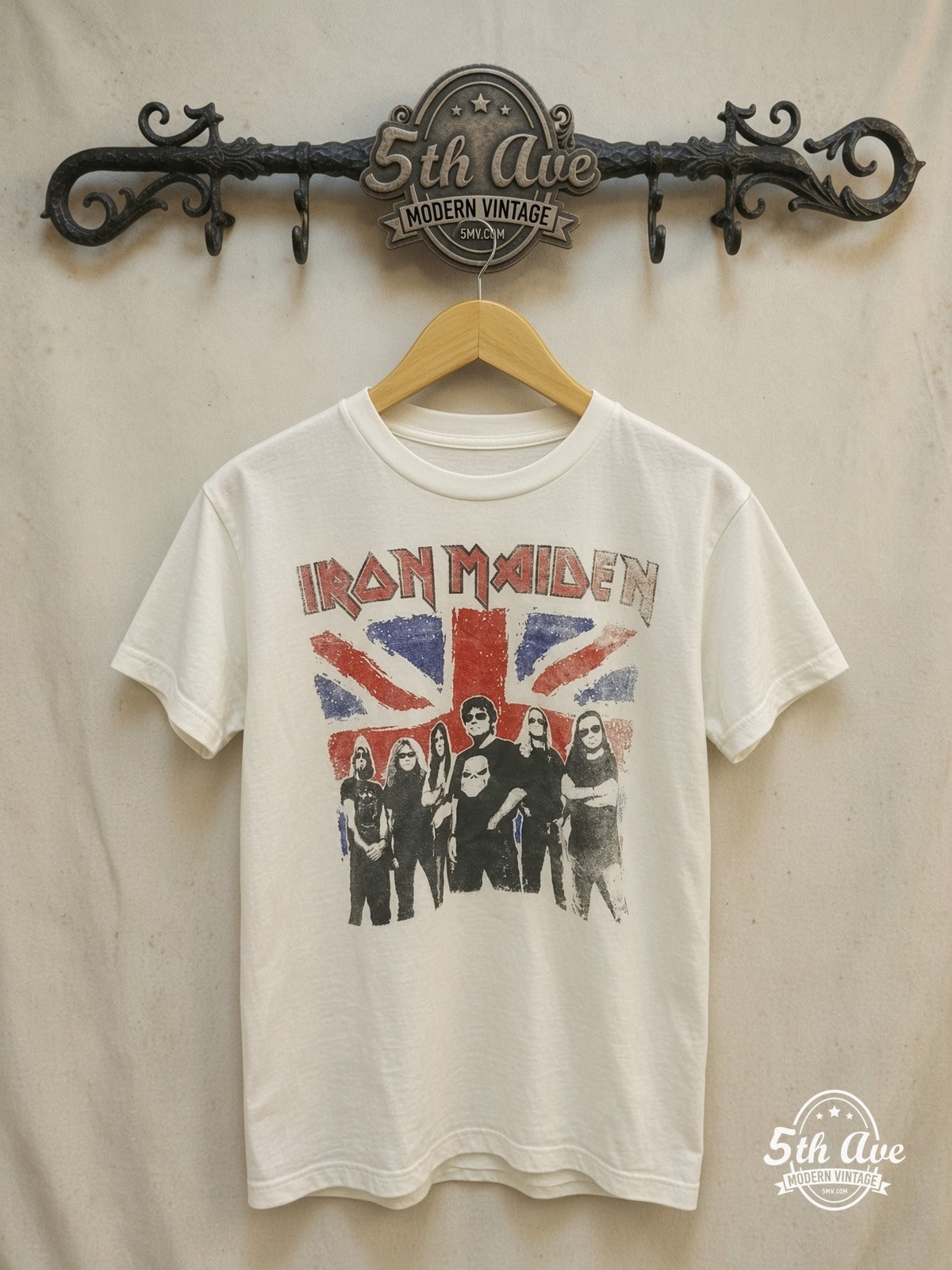 Iron Maiden – Union Jack Band Photo – Vintage Band T-Shirt — front on locked cream ornate 5th Ave rack