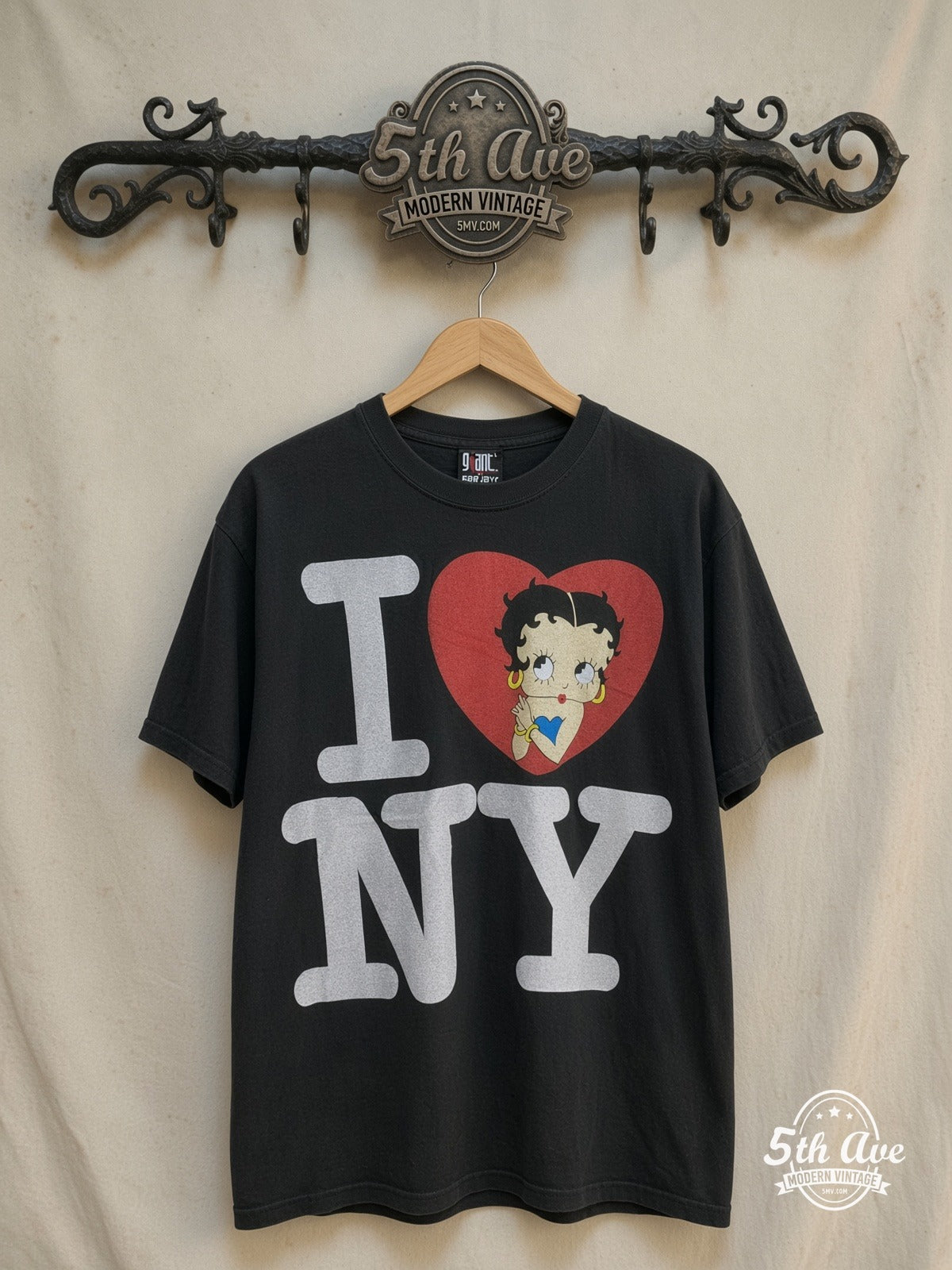 Betty Boop New York Graphic graphic tee, front view on a display rack