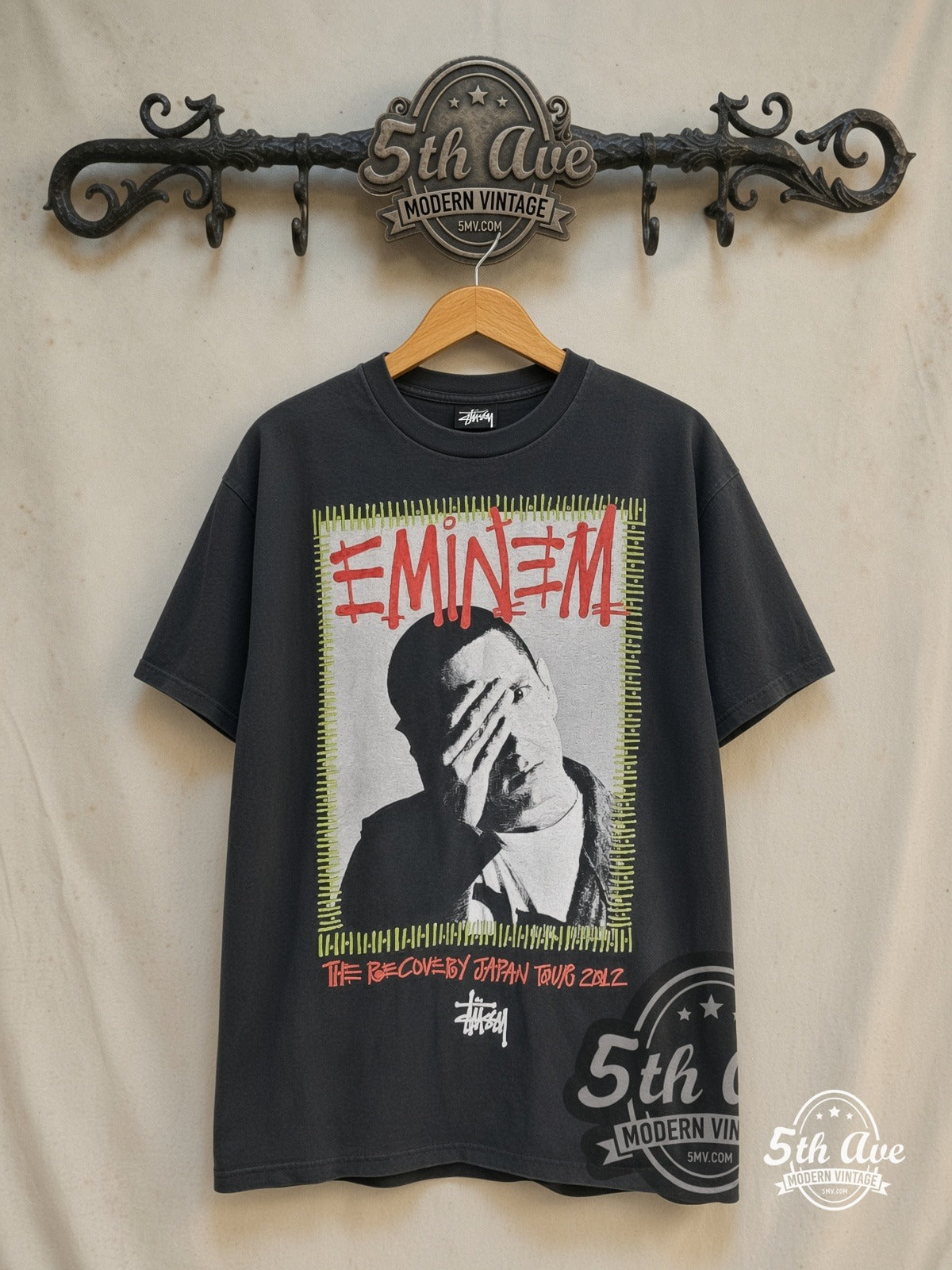 Eminem x Stüssy – Recovery Japan Tour 2012 / Not Afraid – Vintage Band T-Shirt — front on locked cream ornate 5th Ave rack