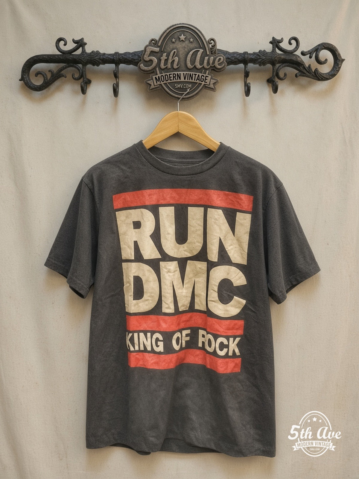 Run-DMC – RUN DMC – Vintage Band T-Shirt — front on locked cream ornate 5th Ave rack