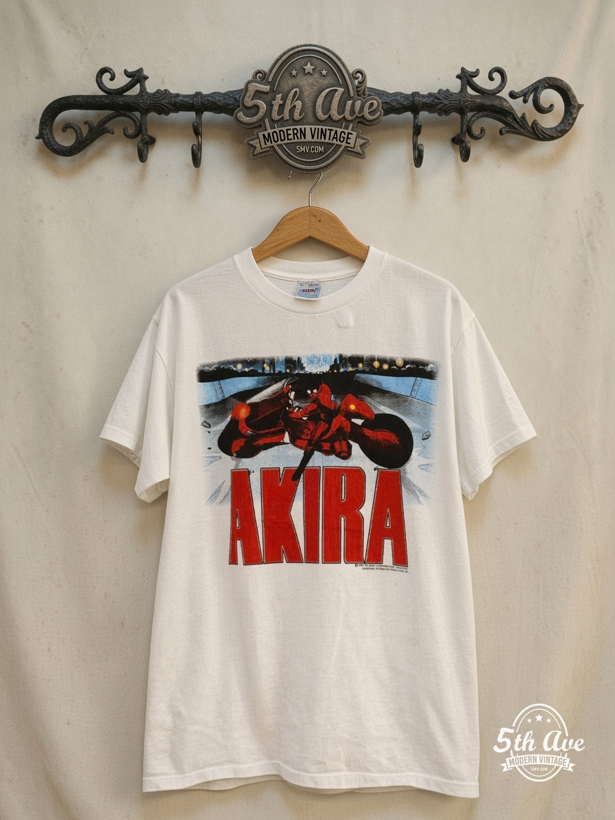 Akira – Kaneda Bike – New Vintage Anime Tee — front on locked cream ornate 5th Ave rack