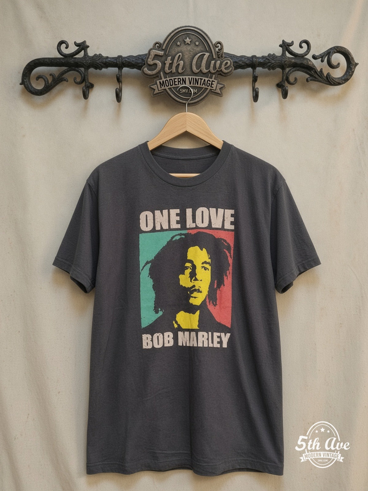 Bob Marley – One Love – Vintage Band T-Shirt — front on locked cream ornate 5th Ave rack