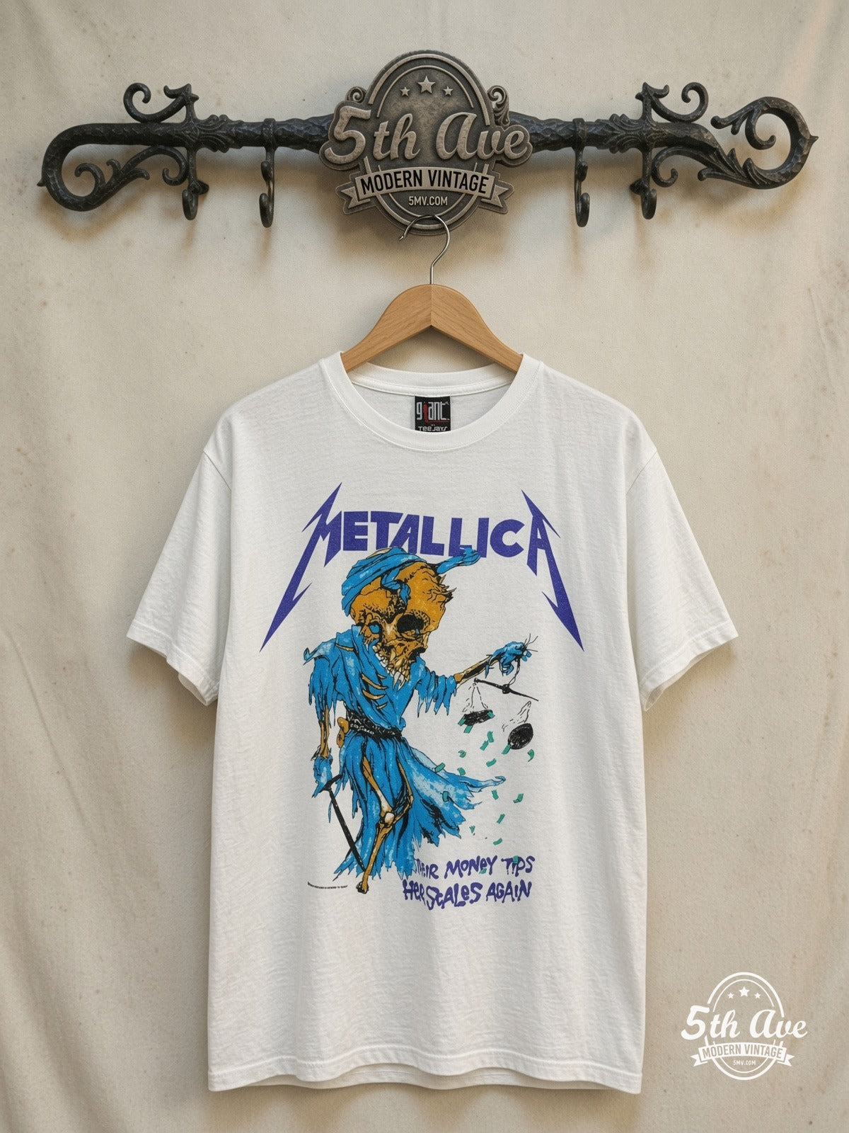 Metallica – Their Money Tips Her Scales Again – Vintage Band T-Shirt — front on locked cream ornate 5th Ave rack