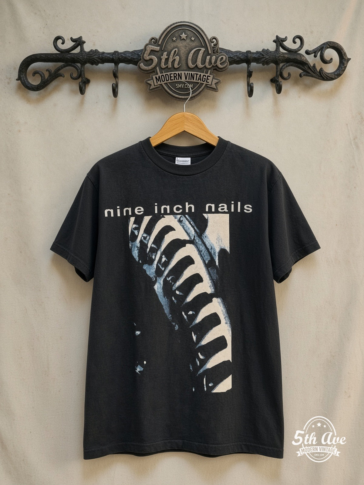 Nine Inch Nails – NIИ 'Now I'm Nothing – Vintage Band T-Shirt — front on locked cream ornate 5th Ave rack