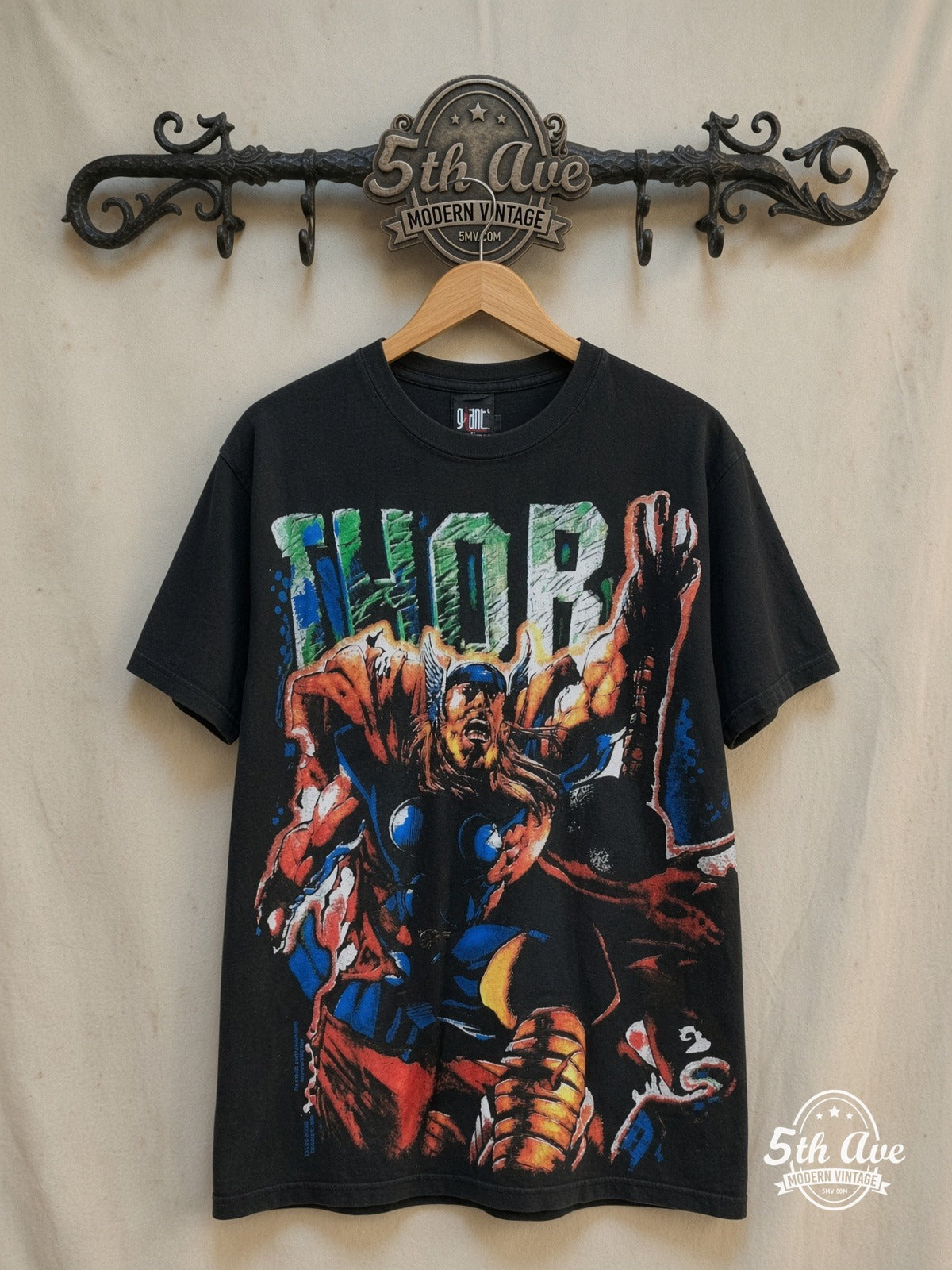 Marvel – Thor Odinson Mjolnir Comic Black All Over Print – Vintage Graphic Tee — front on locked cream ornate 5th Ave rack