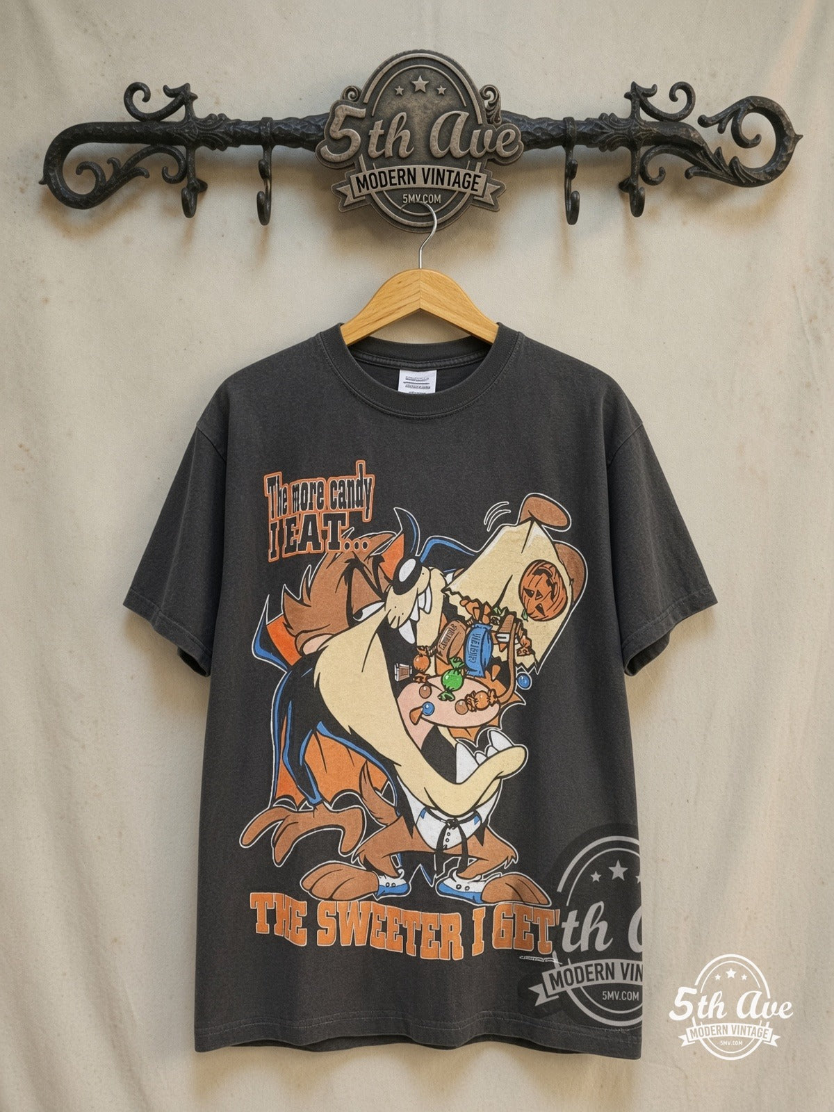 Looney Tunes – Taz-Mania The More Candy I Eat – New Vintage Graphic Tee — front on locked cream ornate 5th Ave rack